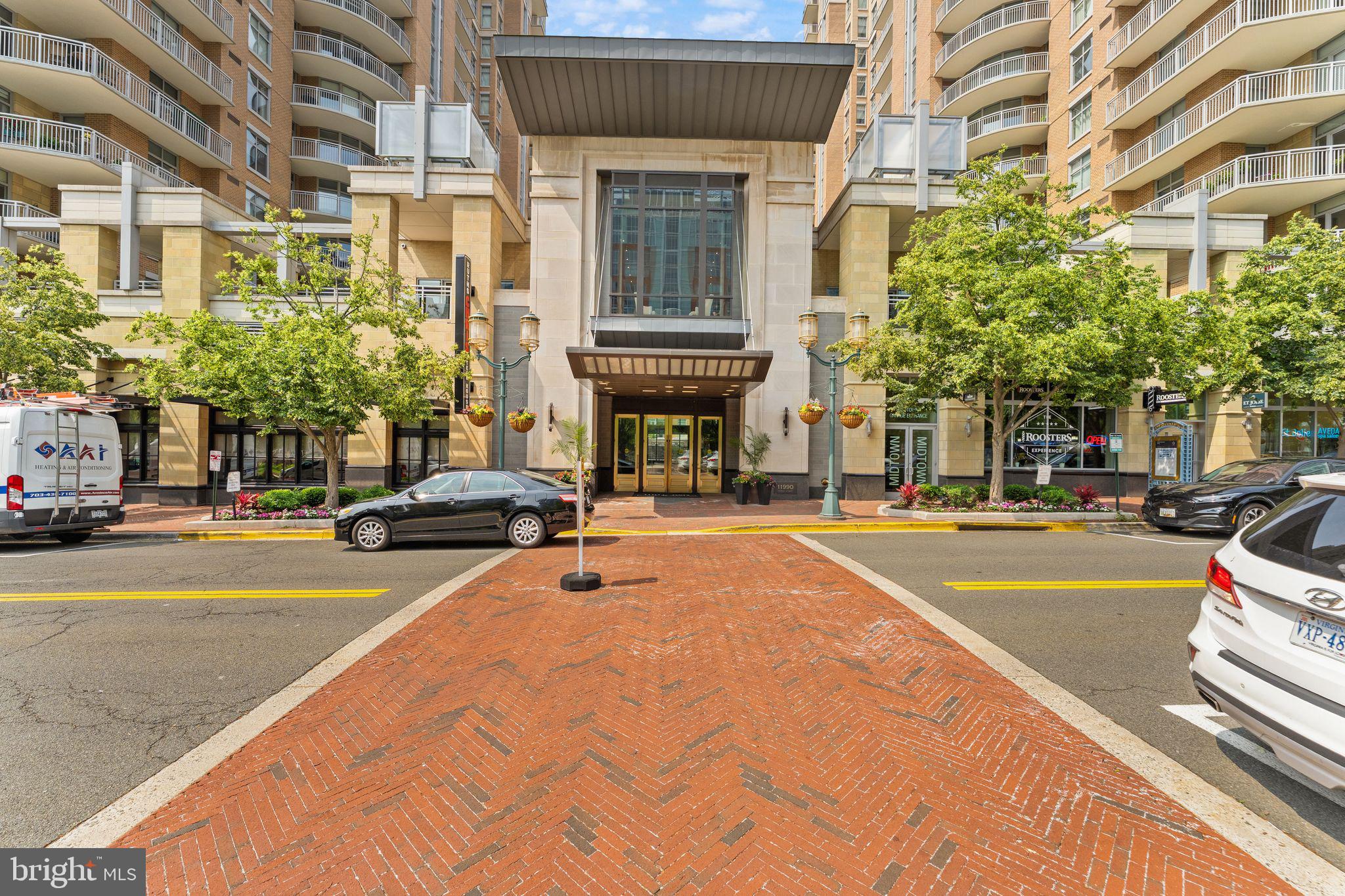 11990 Market Street, Unit 701 Reston, VA 20190 - Photo 2 of 93 a view of a building with a street
