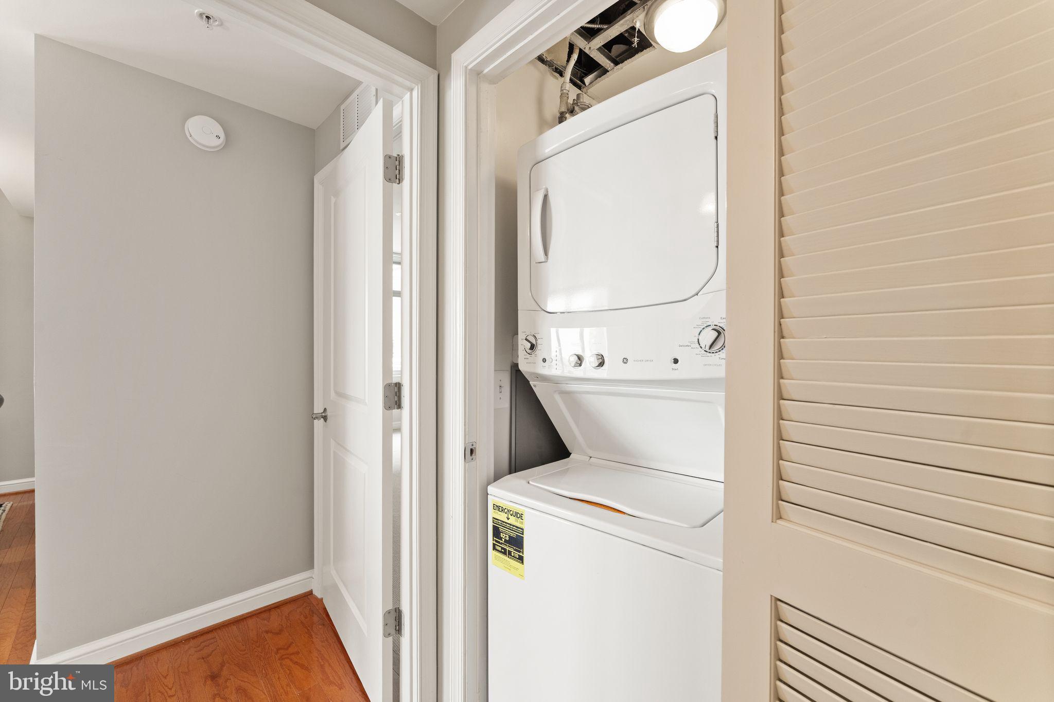 11990 Market Street, Unit 701 Reston, VA 20190 - Photo 27 of 93 a utility room with dryer and washer
