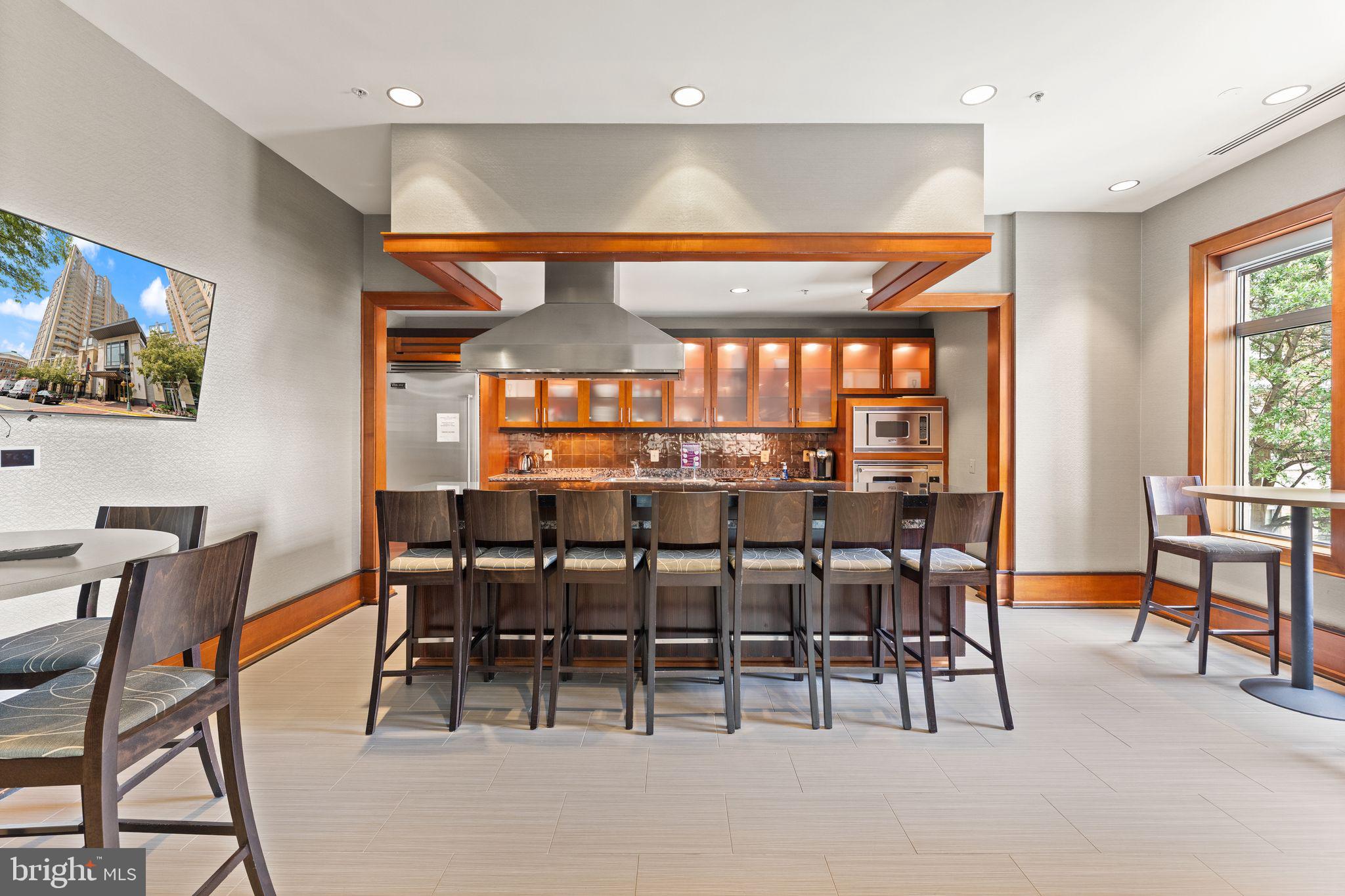 11990 Market Street, Unit 701 Reston, VA 20190 - Photo 66 of 93 a view of a dining room with furniture