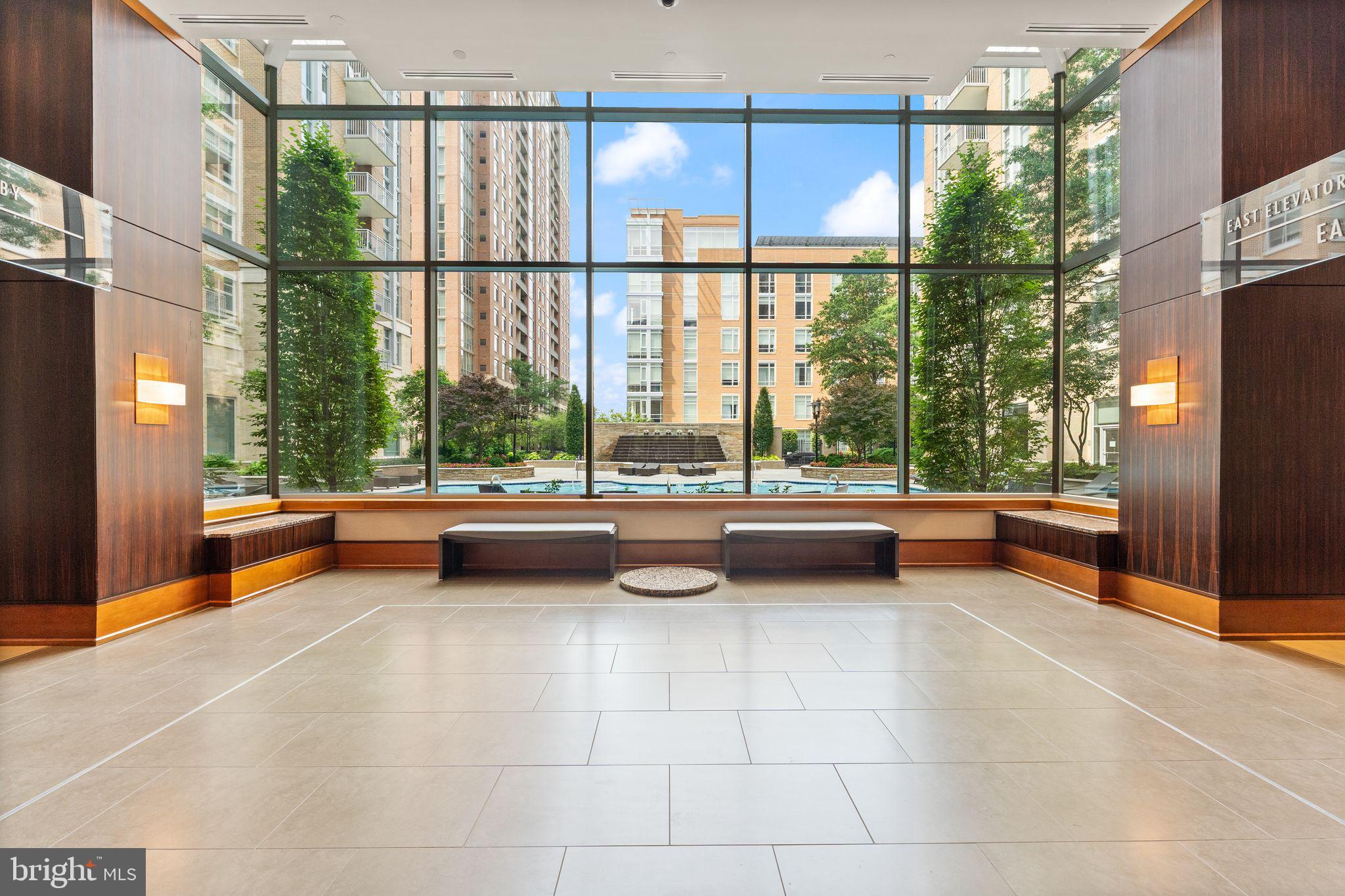 11990 Market Street, Unit 701 Reston, VA 20190 - Photo 70 of 93 a view of lobby with furniture and large windows