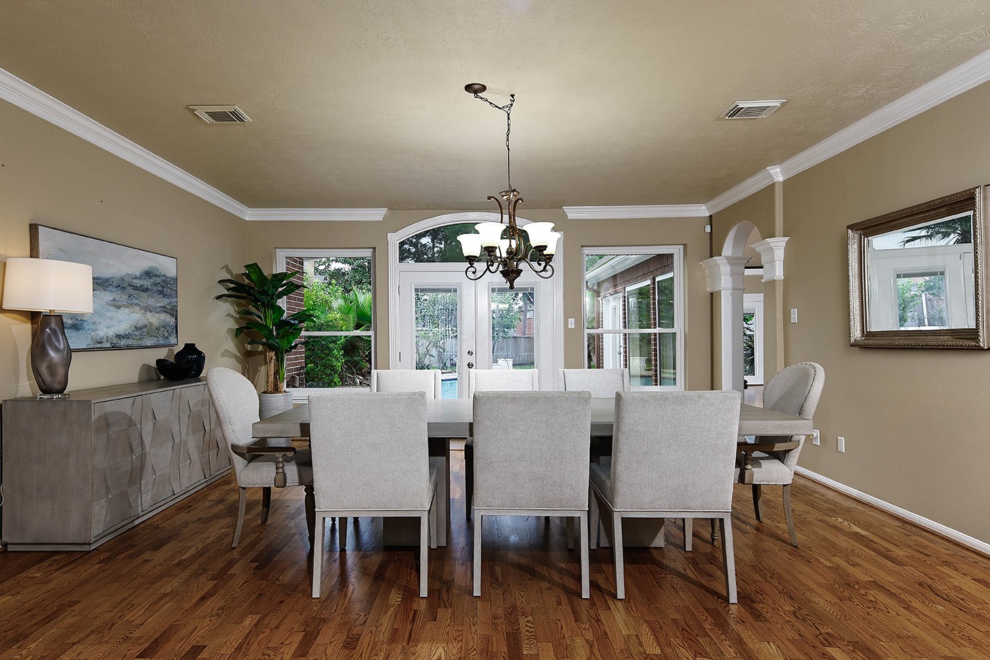 18834 Forest Elms Drive Spring, TX 77388 - Photo 4 of 47 a view of a dining room with furniture wooden floor and chandelier
