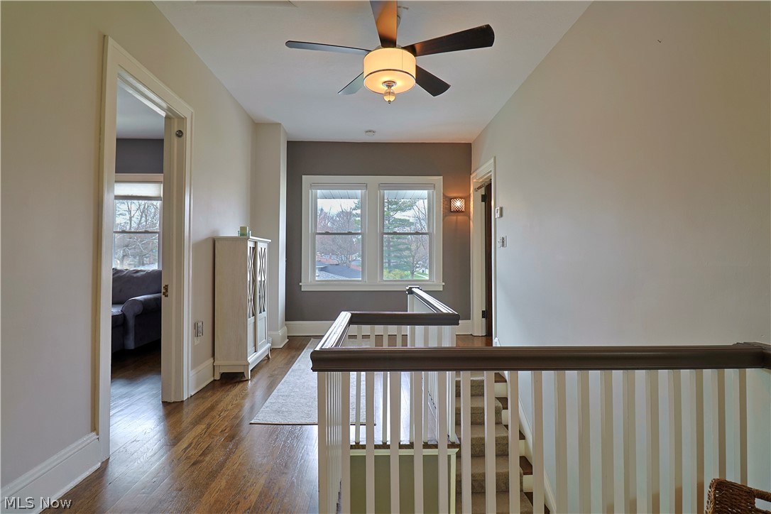 4376 Dover Center Road North Olmsted, OH 44070 - Photo 15 of 34 Hallway featuring dark hardwood / wood-style flooring