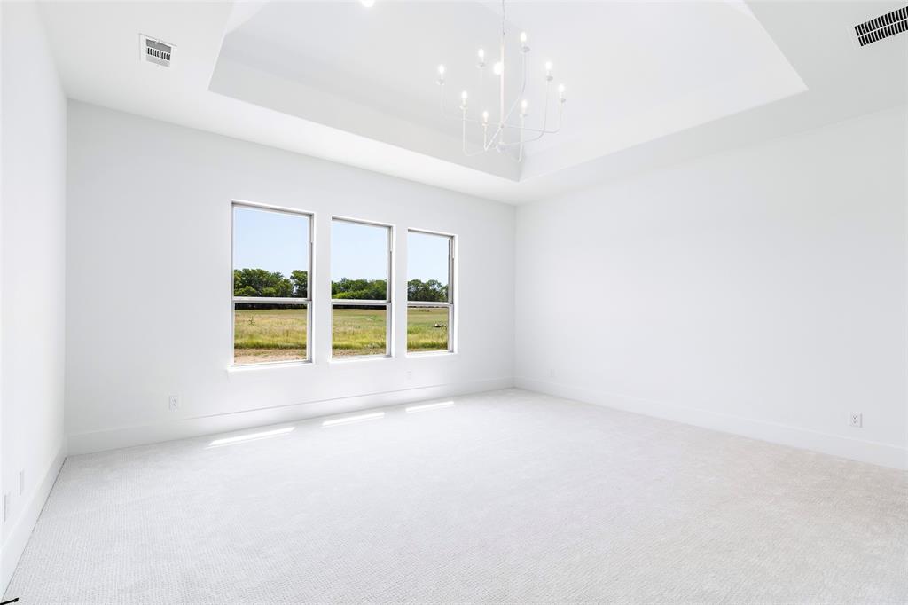 800 Vest Lane Pilot Point, TX 76258 - Photo 10 of 15 an empty room with a window