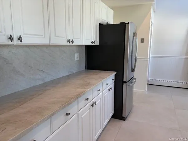an empty room with cabinet