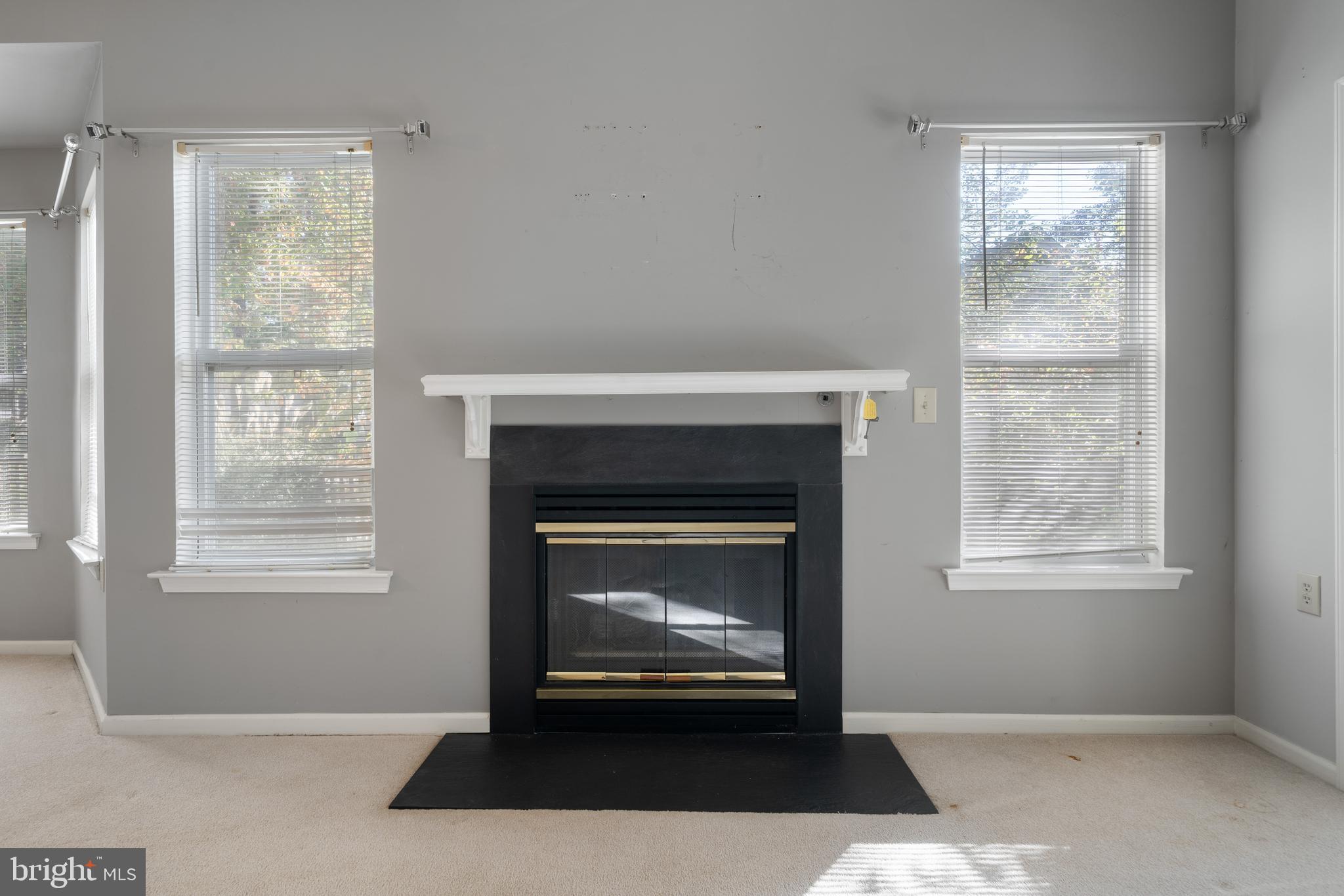 16 Newport Road Manahawkin, NJ 08050 - Photo 11 of 36 a living room with a fireplace