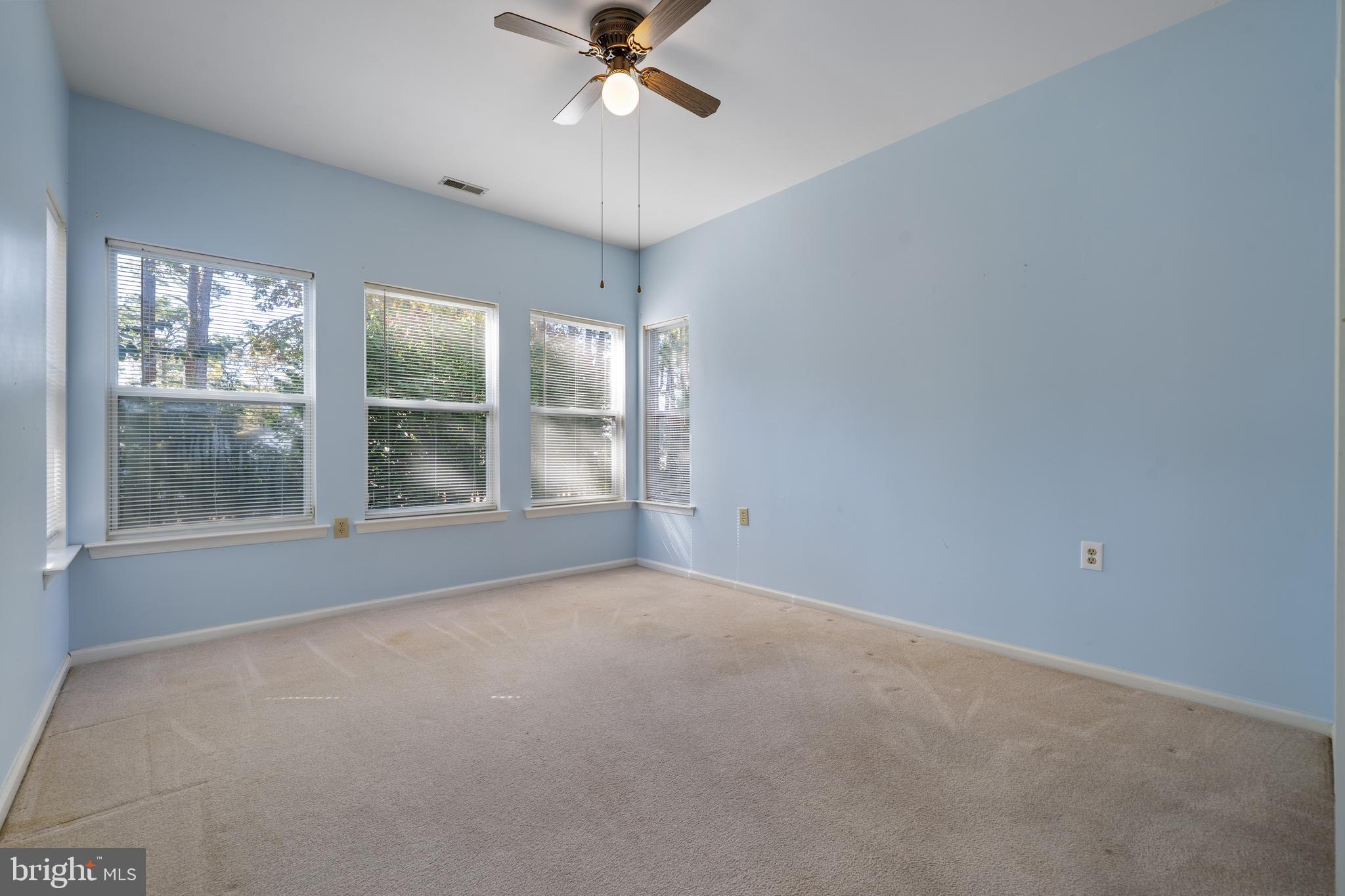 16 Newport Road Manahawkin, NJ 08050 - Photo 15 of 36 a view of an empty room with a window