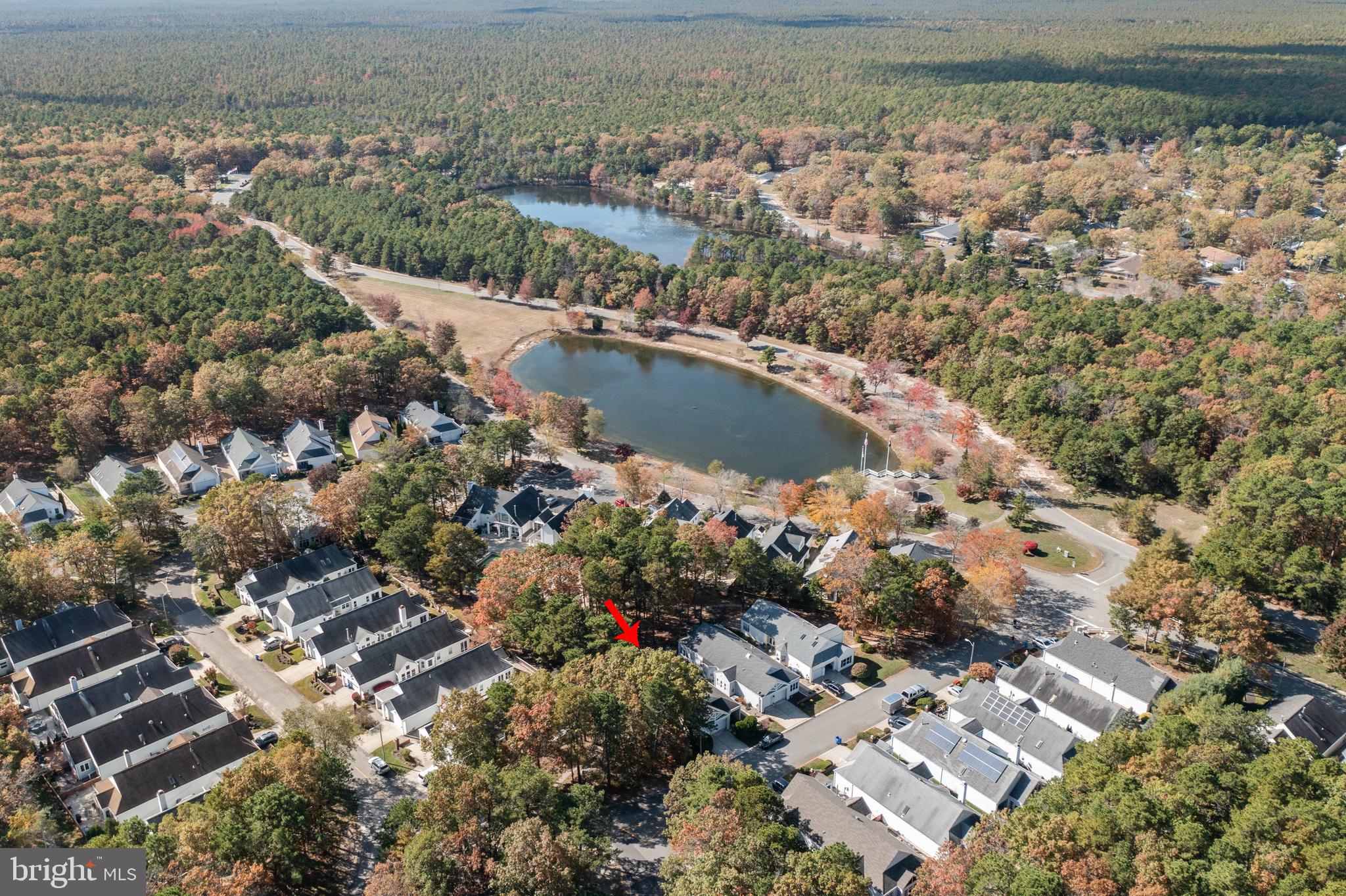16 Newport Road Manahawkin, NJ 08050 - Photo 28 of 36 an aerial view of residential houses with outdoor space