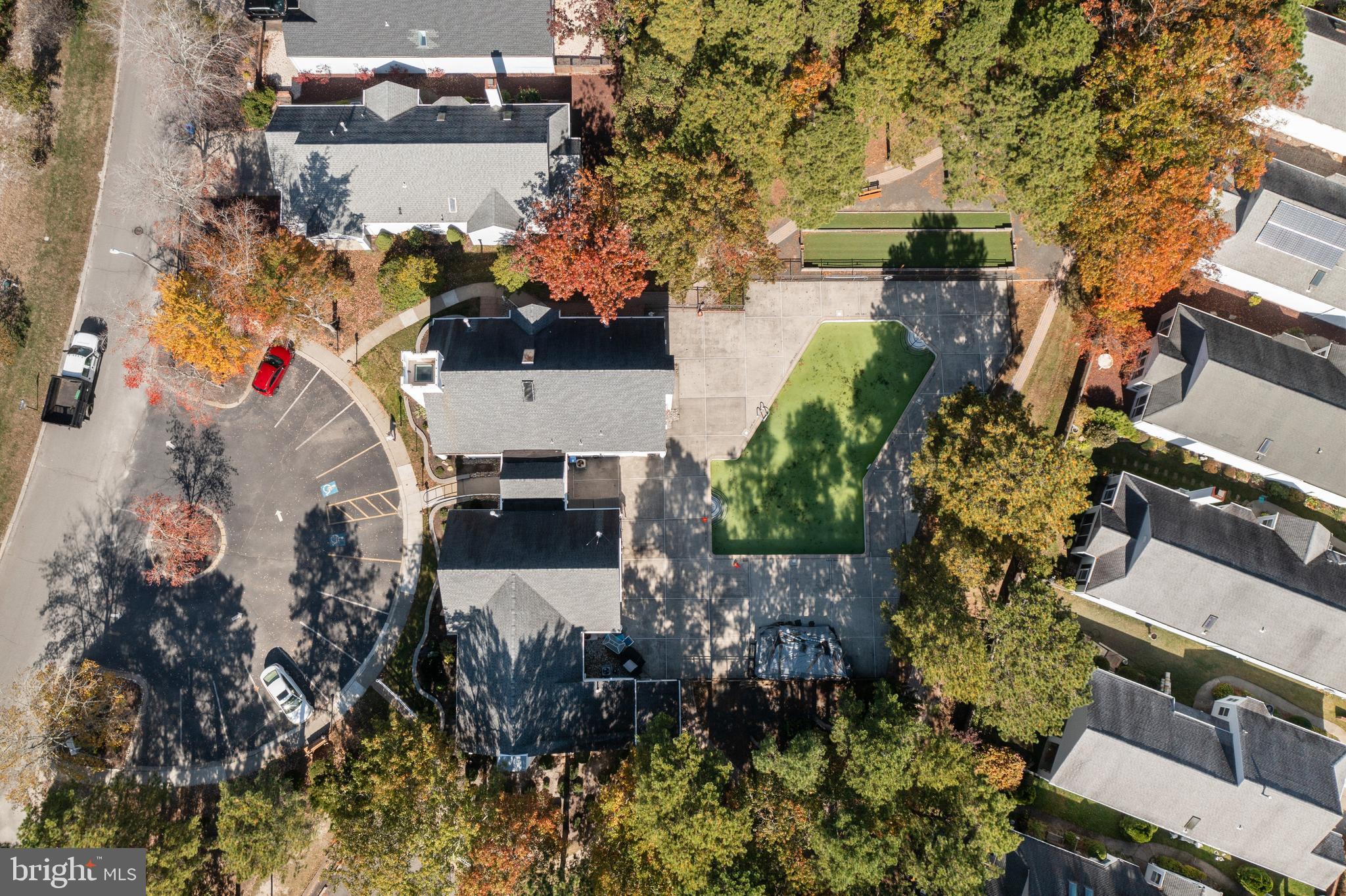 16 Newport Road Manahawkin, NJ 08050 - Photo 36 of 36 an aerial view of a house with a yard and a large tree
