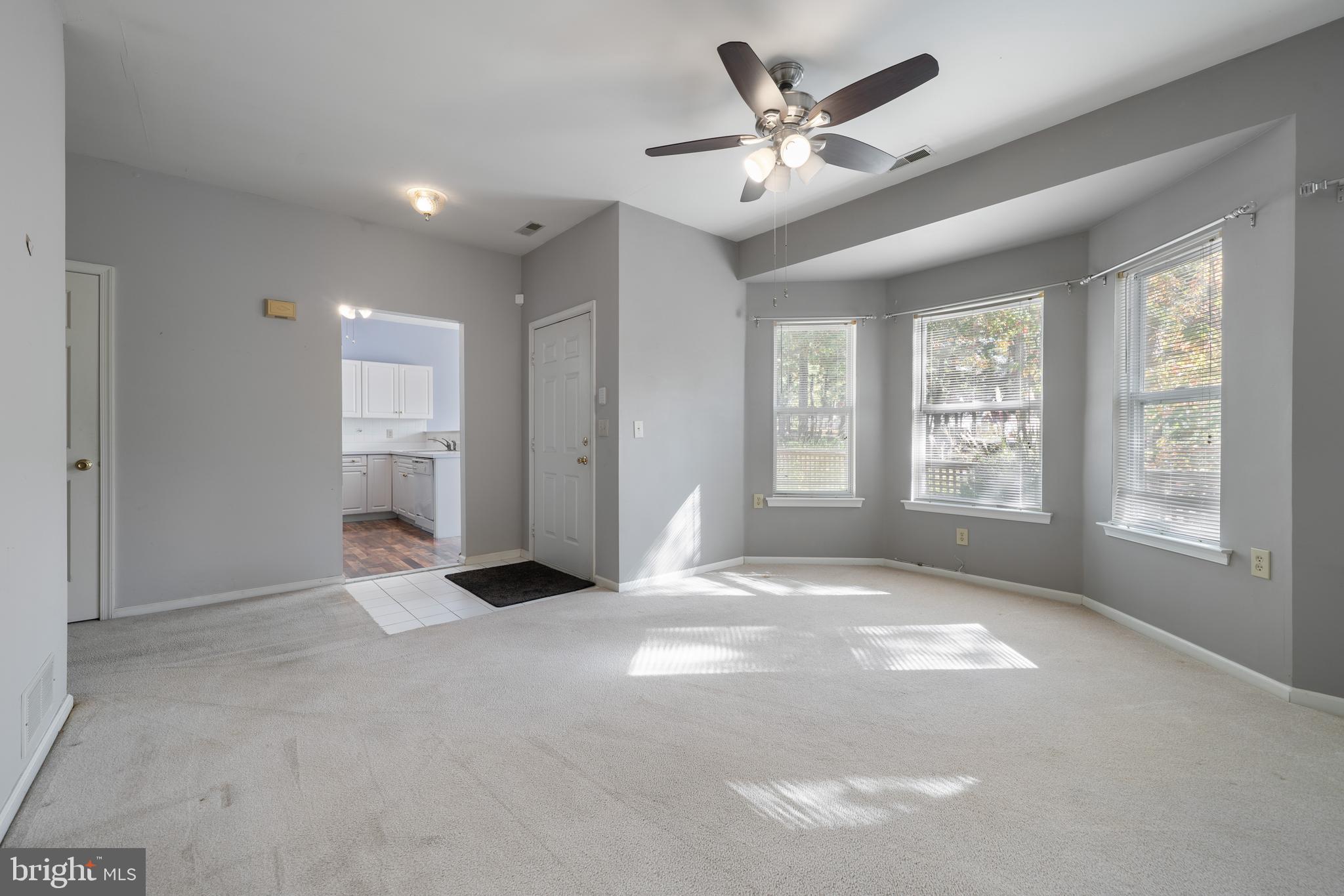 16 Newport Road Manahawkin, NJ 08050 - Photo 5 of 36 a view of an empty room with a window