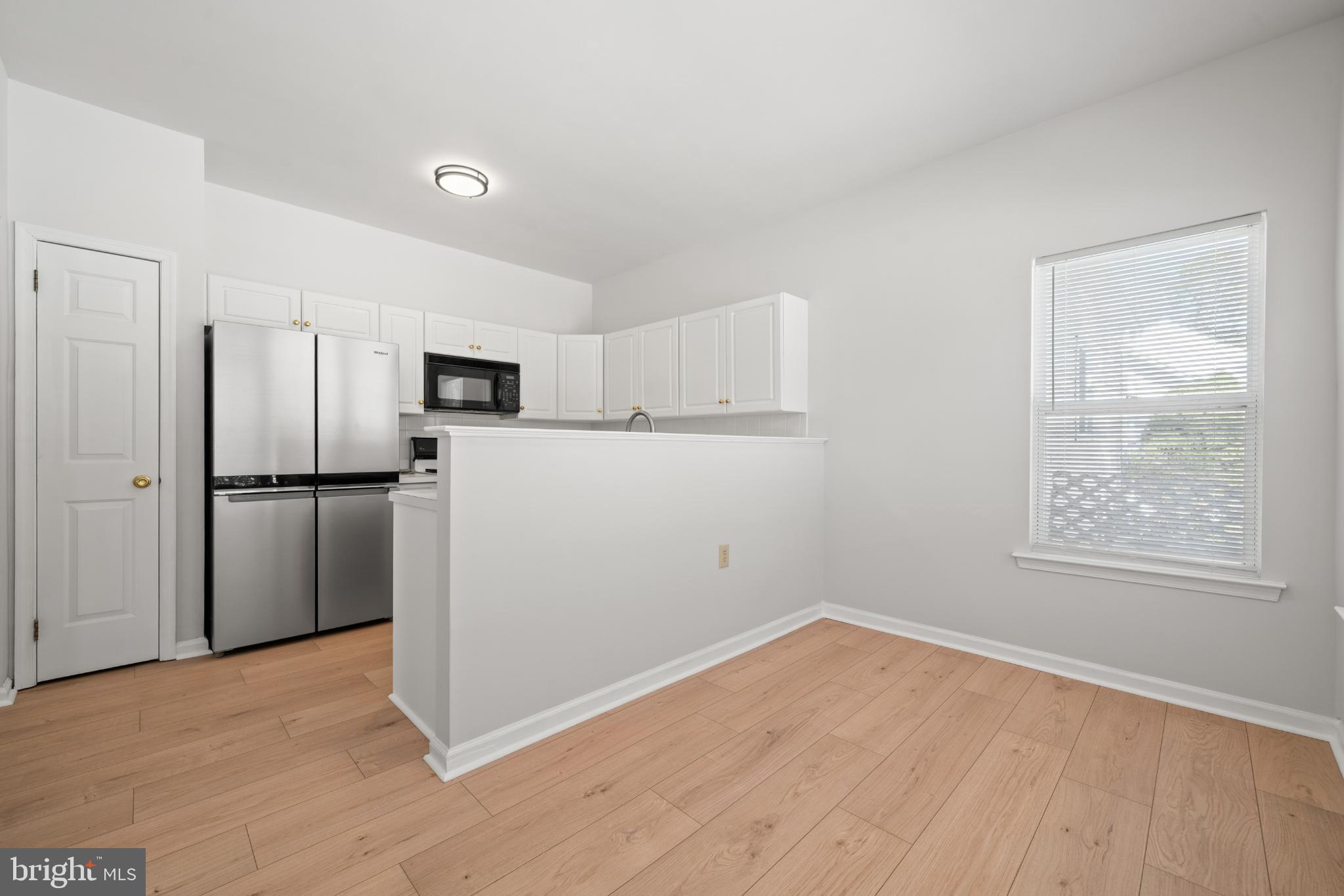 16 Newport Road Manahawkin, NJ 08050 - Photo 7 of 29 Modern kitchen with sleek appliances.
