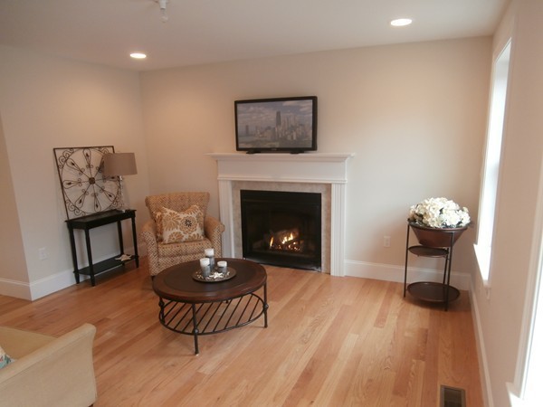 81 Bellevue Road Andover, MA 01810 - Photo 2 of 11 a living room with furniture and a fireplace