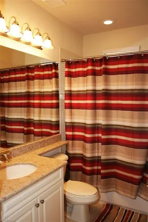 a bathroom with a sink and a toilet