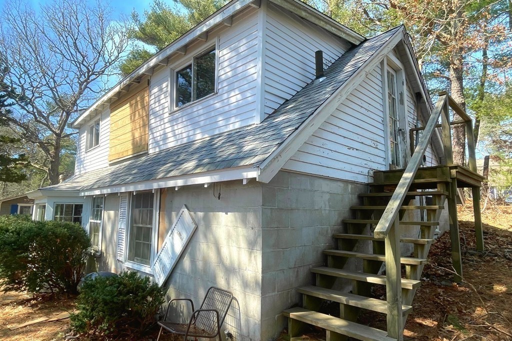 43 Horseshoe Bend Way Mashpee, MA 02649 - Photo 5 of 7 a view of a house with wooden stairs