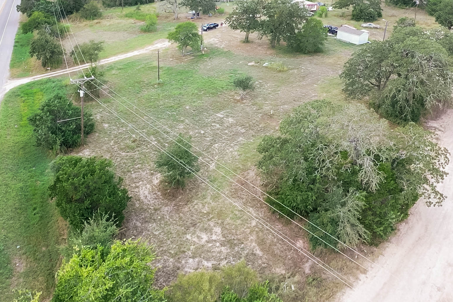 113 Hannah Road, Unit A Smithville, TX 78957 - Photo 11 of 11 a view of a pathway both side of green field