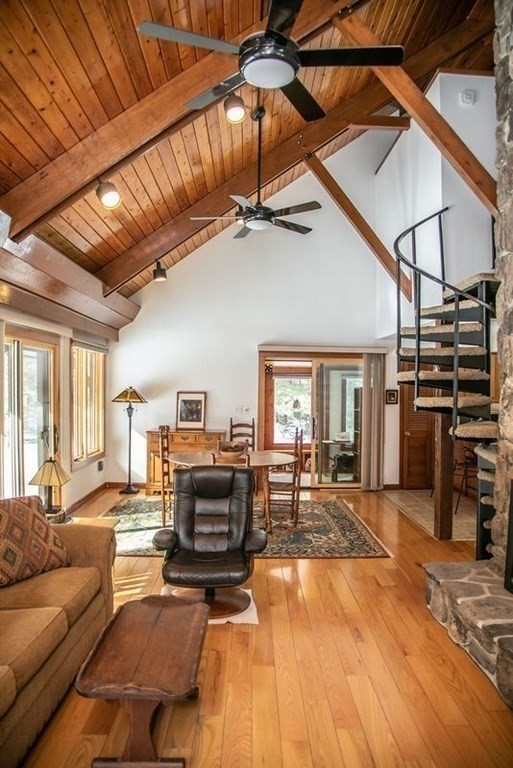 197 Southampton Road Westhampton, MA 01027 - Photo 23 of 42 a living room with furniture and a fireplace
