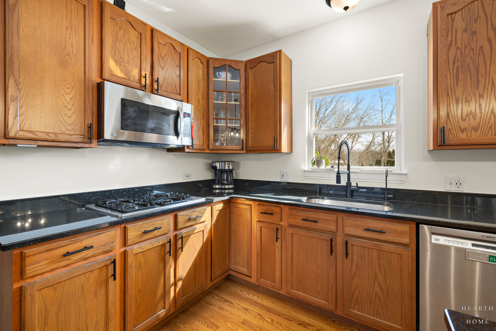 10514 Ridge Lane Marengo, IL 60152 - Photo 10 of 51 a kitchen with granite countertop cabinets stainless steel appliances a sink and a window