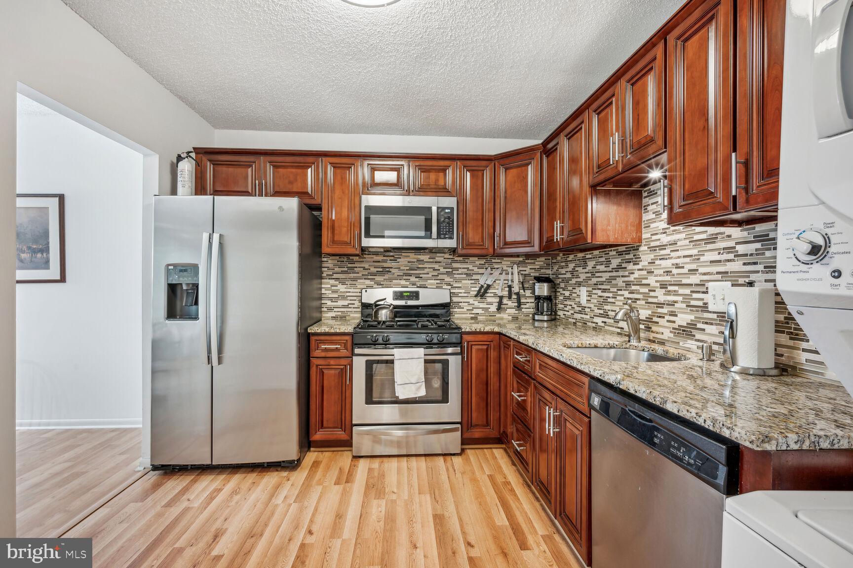 11833 Shire Court, Unit 2C Reston, VA 20191 - Photo 10 of 20 Upgraded Kitchen