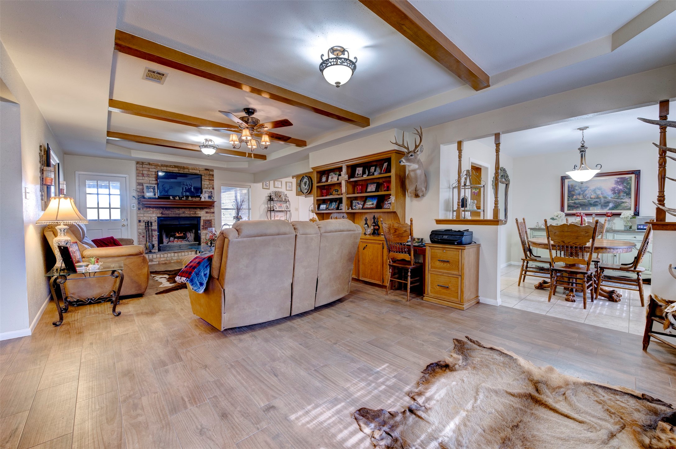 1664 Farm To Market 1010 Road Cleveland, TX 77327 - Photo 11 of 50 a living room with furniture and a fireplace