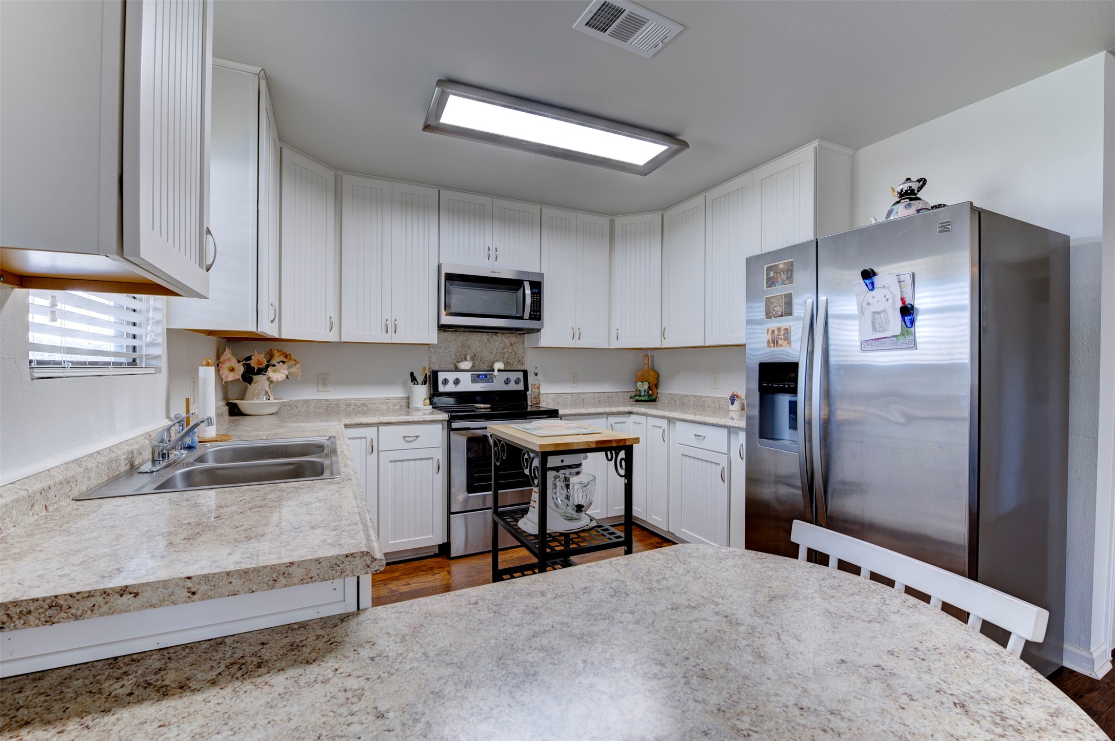 1664 Farm To Market 1010 Road Cleveland, TX 77327 - Photo 35 of 50 a kitchen with a refrigerator stove and sink
