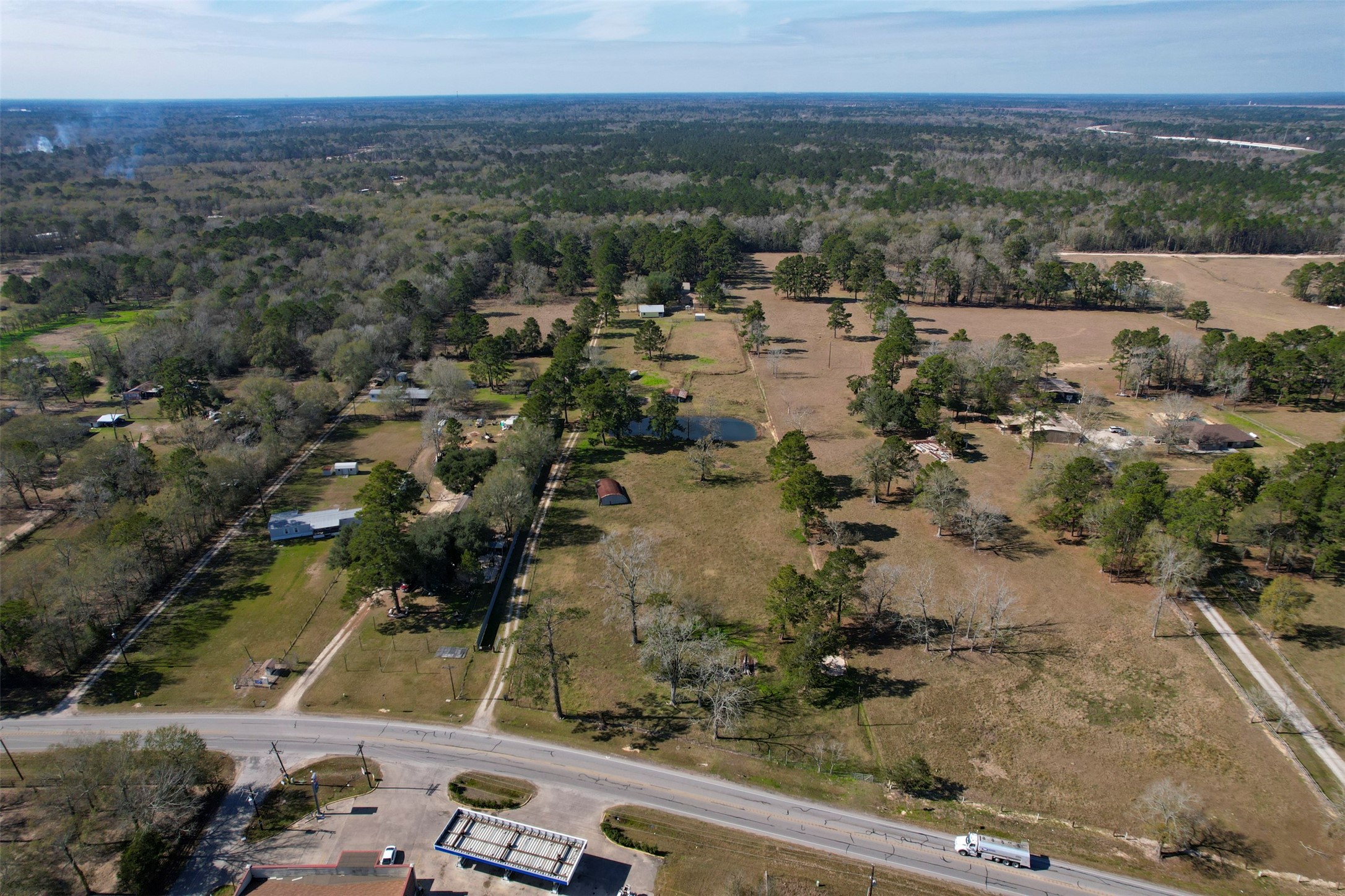 1664 Farm To Market 1010 Road Cleveland, TX 77327 - Photo 42 of 50 an aerial view of residential houses with outdoor space