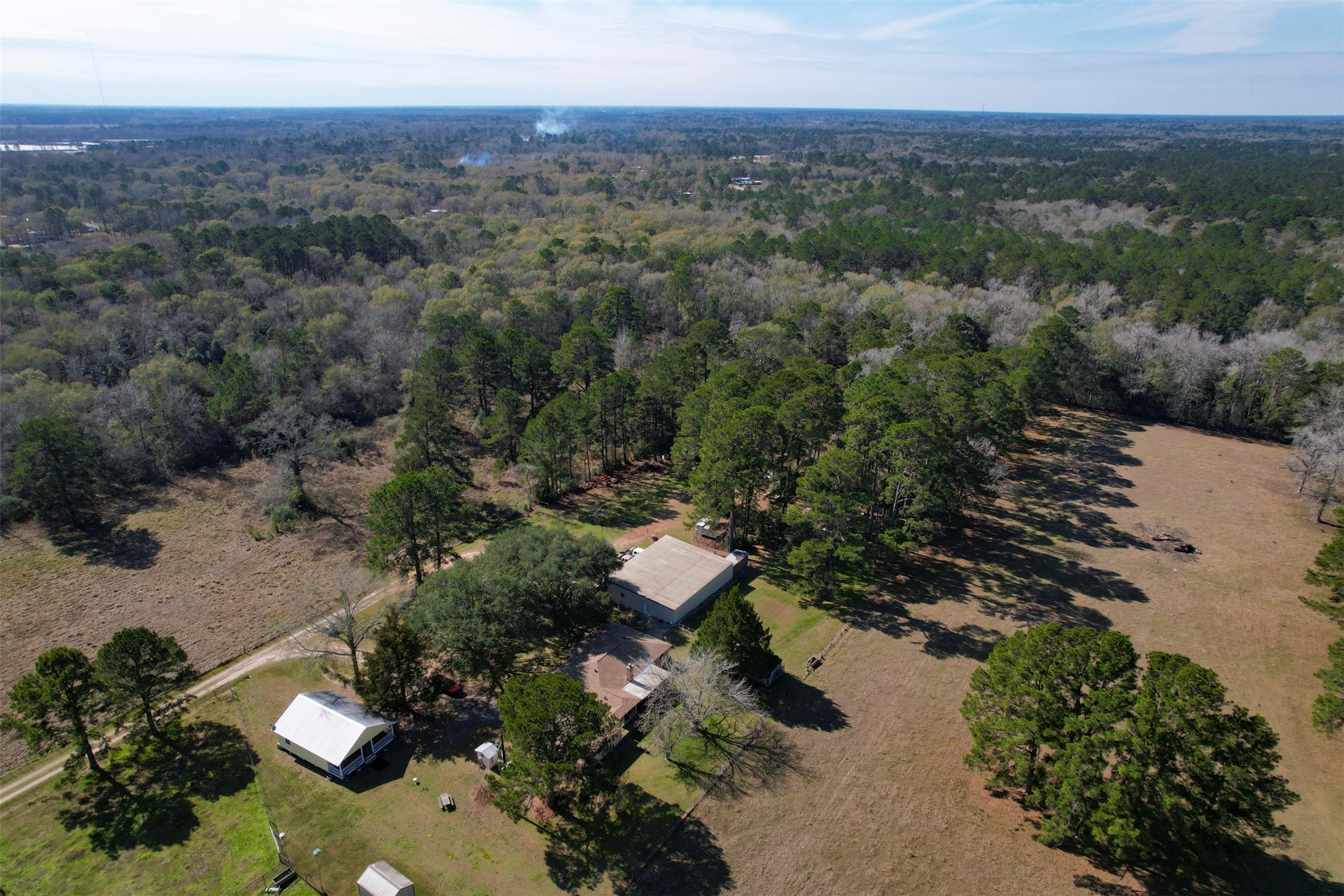 1664 Farm To Market 1010 Road Cleveland, TX 77327 - Photo 44 of 50 an aerial view of a houses with a yard