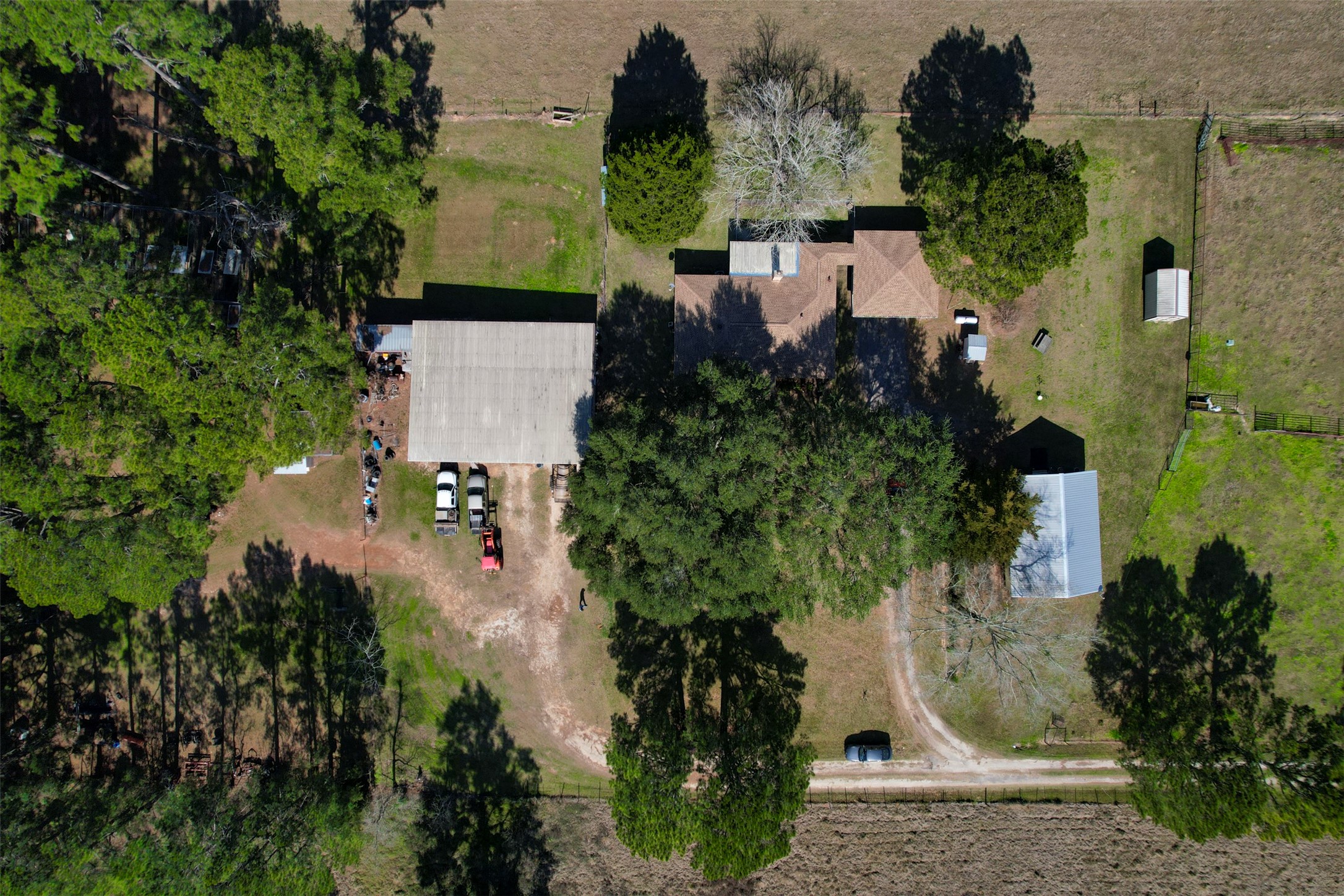 1664 Farm To Market 1010 Road Cleveland, TX 77327 - Photo 46 of 50 an aerial view of a house with a yard