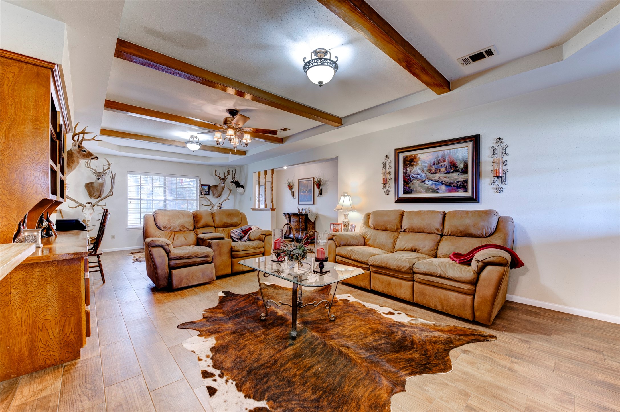 1664 Farm To Market 1010 Road Cleveland, TX 77327 - Photo 7 of 50 a living room with furniture and a chandelier