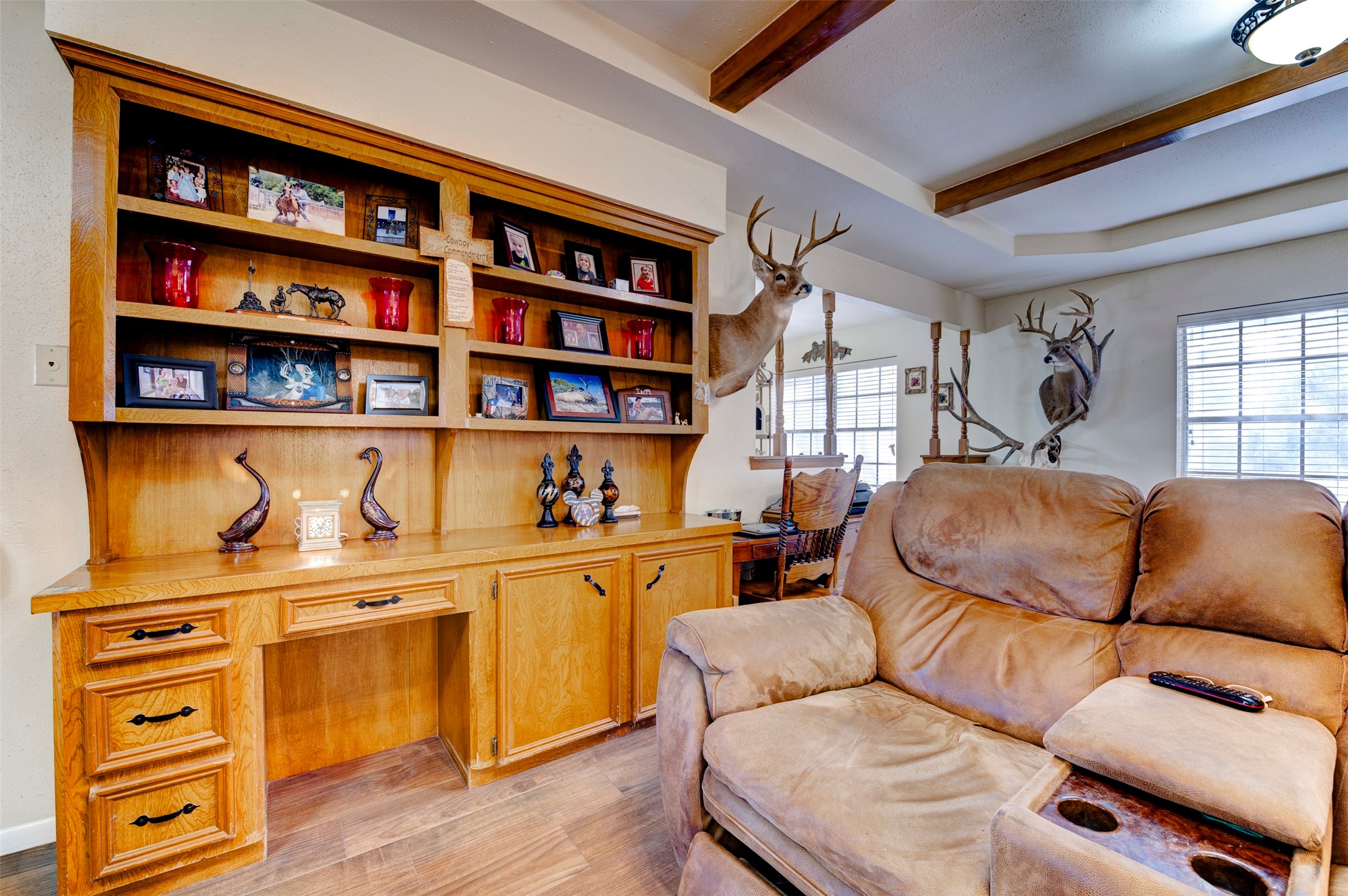 1664 Farm To Market 1010 Road Cleveland, TX 77327 - Photo 10 of 50 a living room with furniture cabinets and a bookshelf