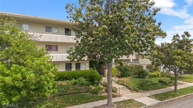 an aerial view of a city with lots of residential buildings