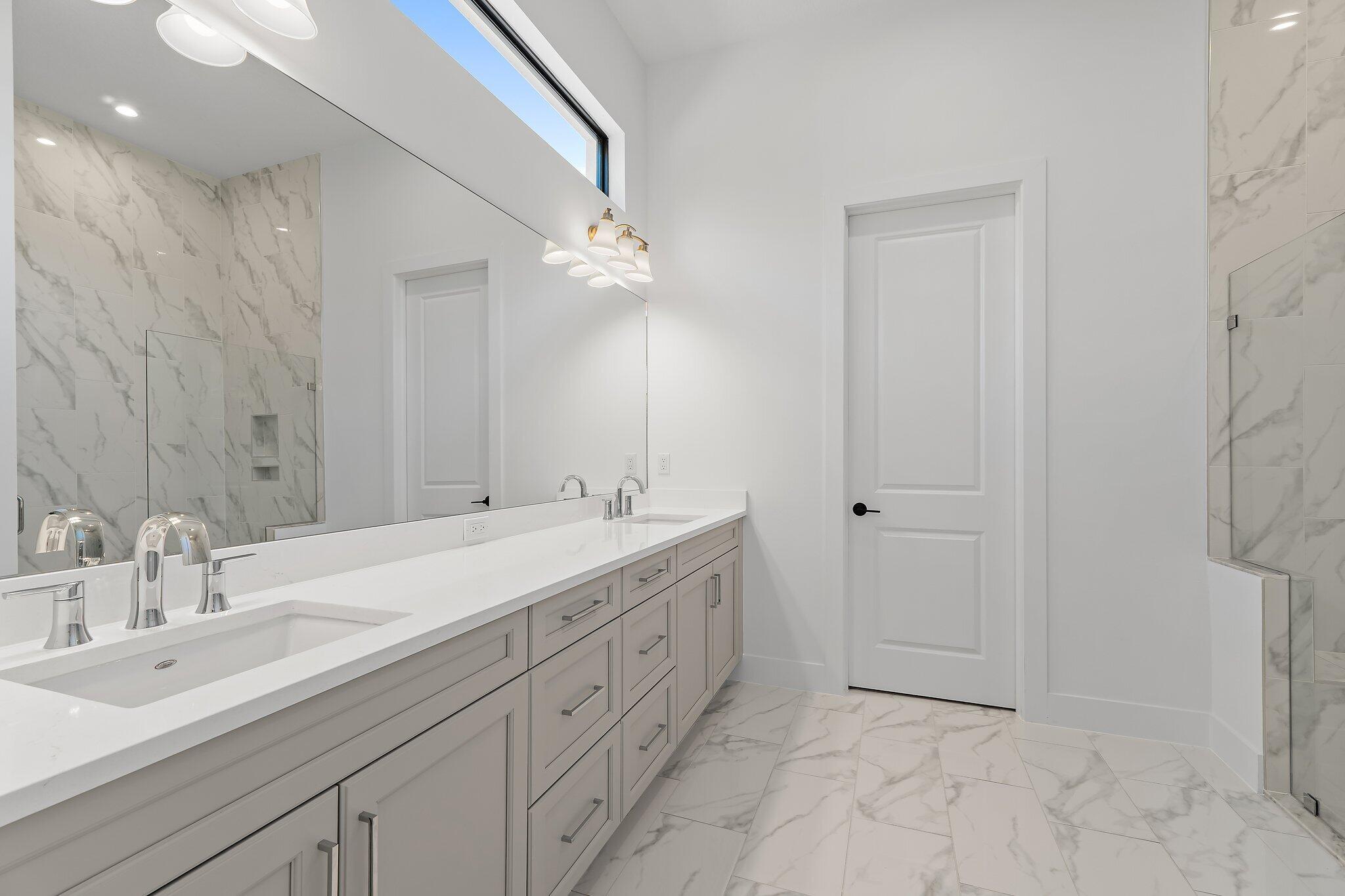 6880 Southeast Haven Lane Stuart, FL 34997 - Photo 14 of 38 Owner's Suite Bath