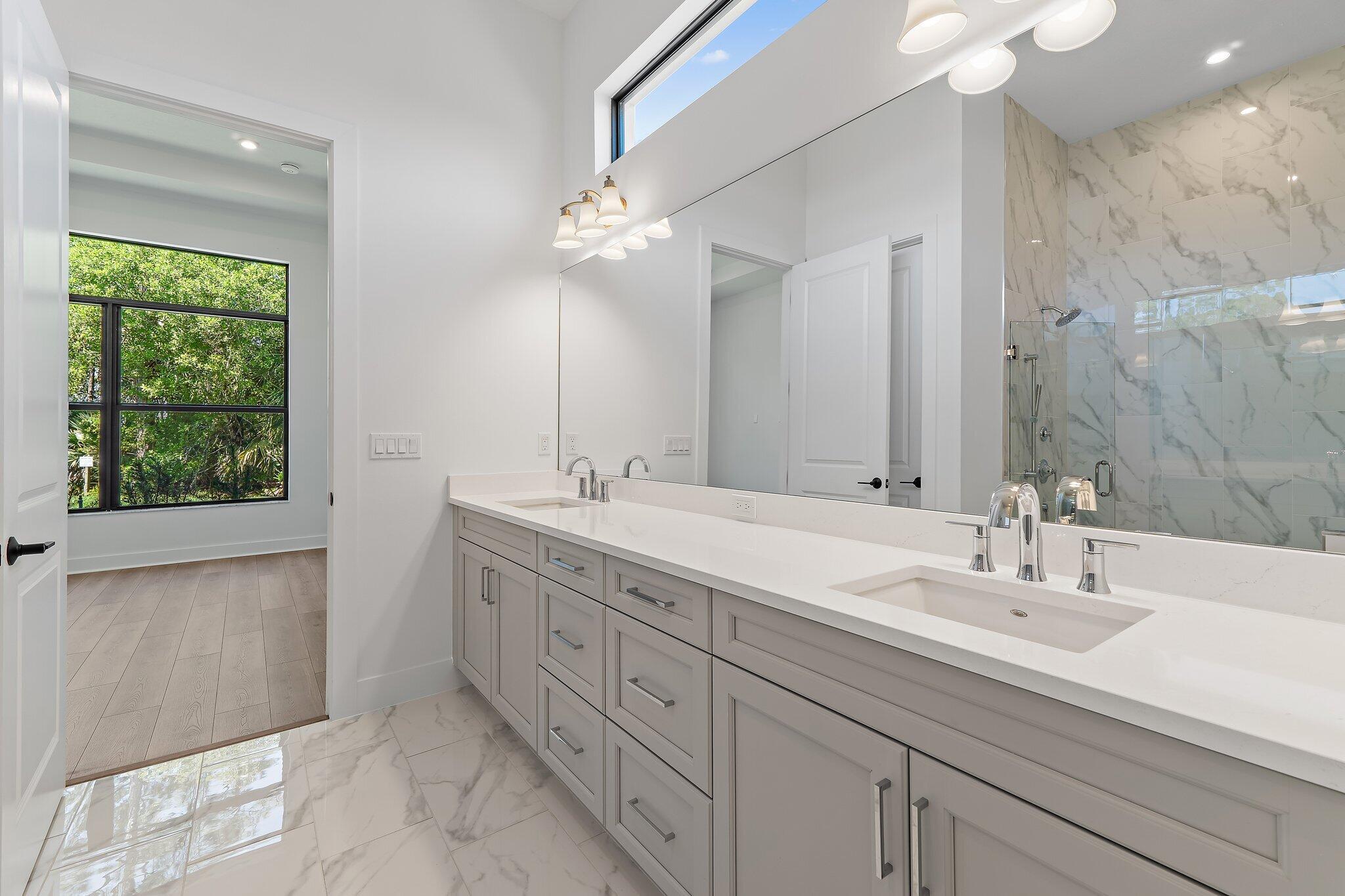 6880 Southeast Haven Lane Stuart, FL 34997 - Photo 16 of 38 Owner's Suite Bath