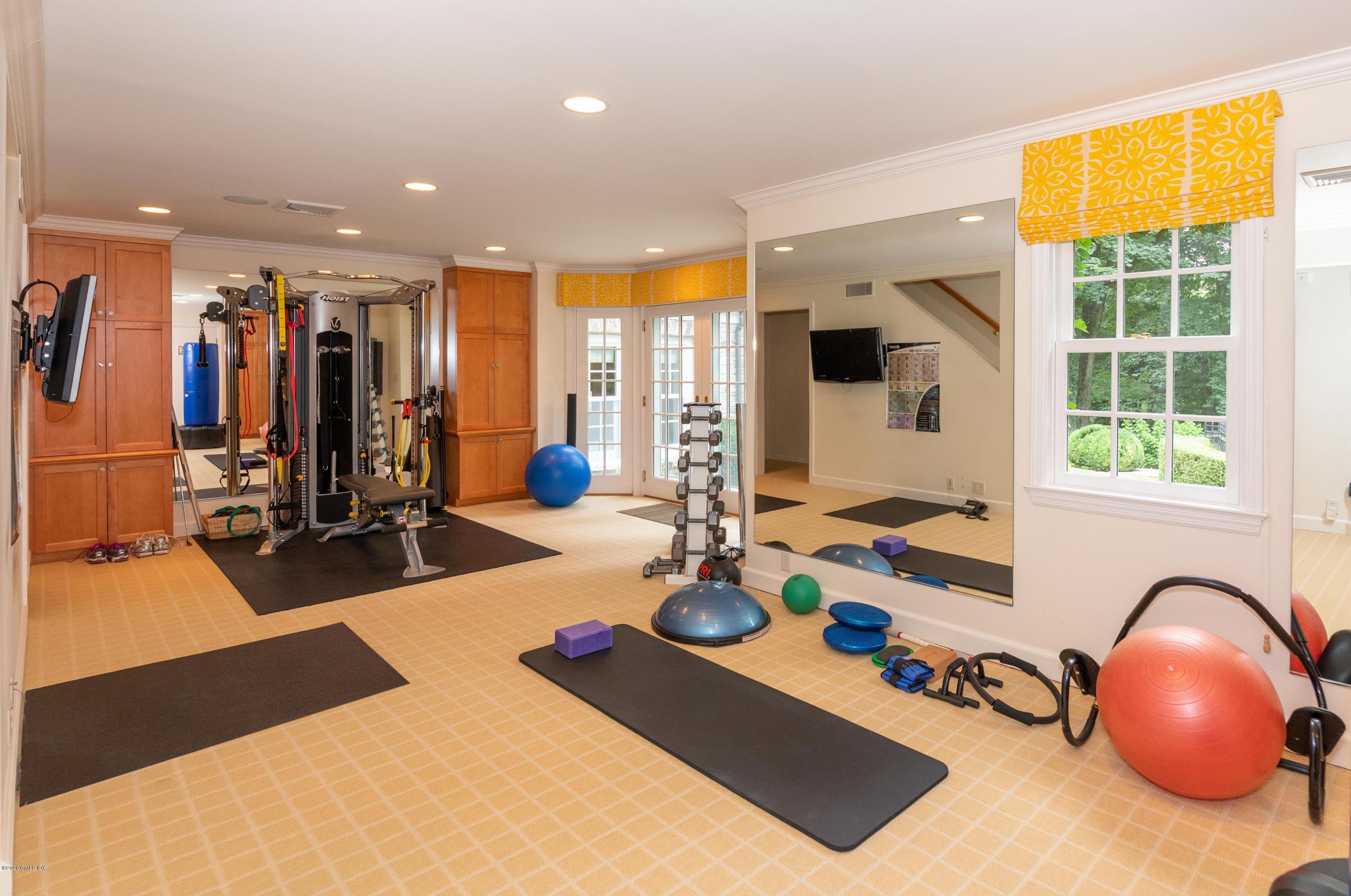 23 Boulder Brook Road Greenwich, CT 06830 - Photo 20 of 27 a view of a room with gym equipment