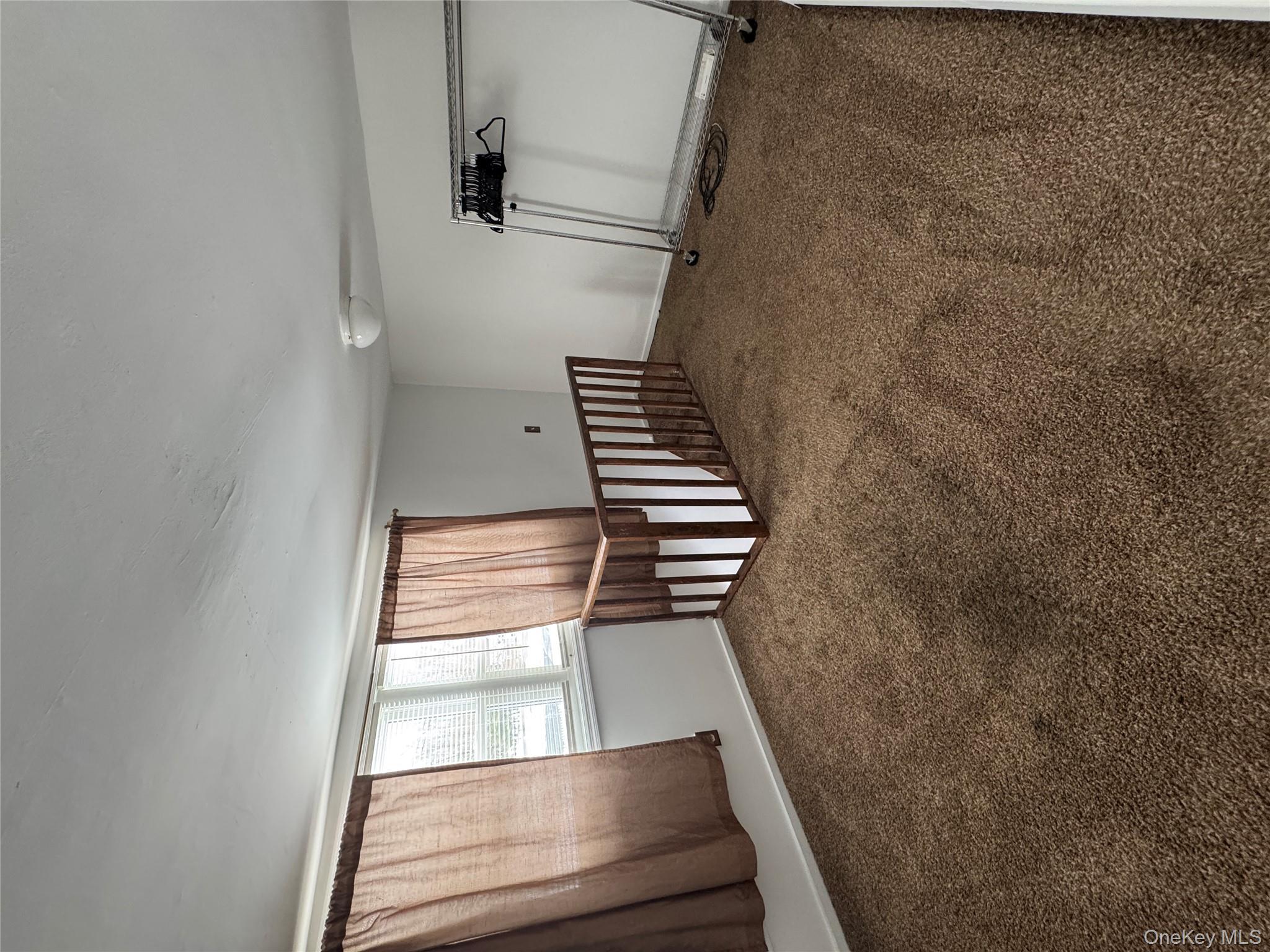 523 Fostertown Road Newburgh, NY 12550 - Photo 12 of 15 Unfurnished room with carpet flooring and baseboards