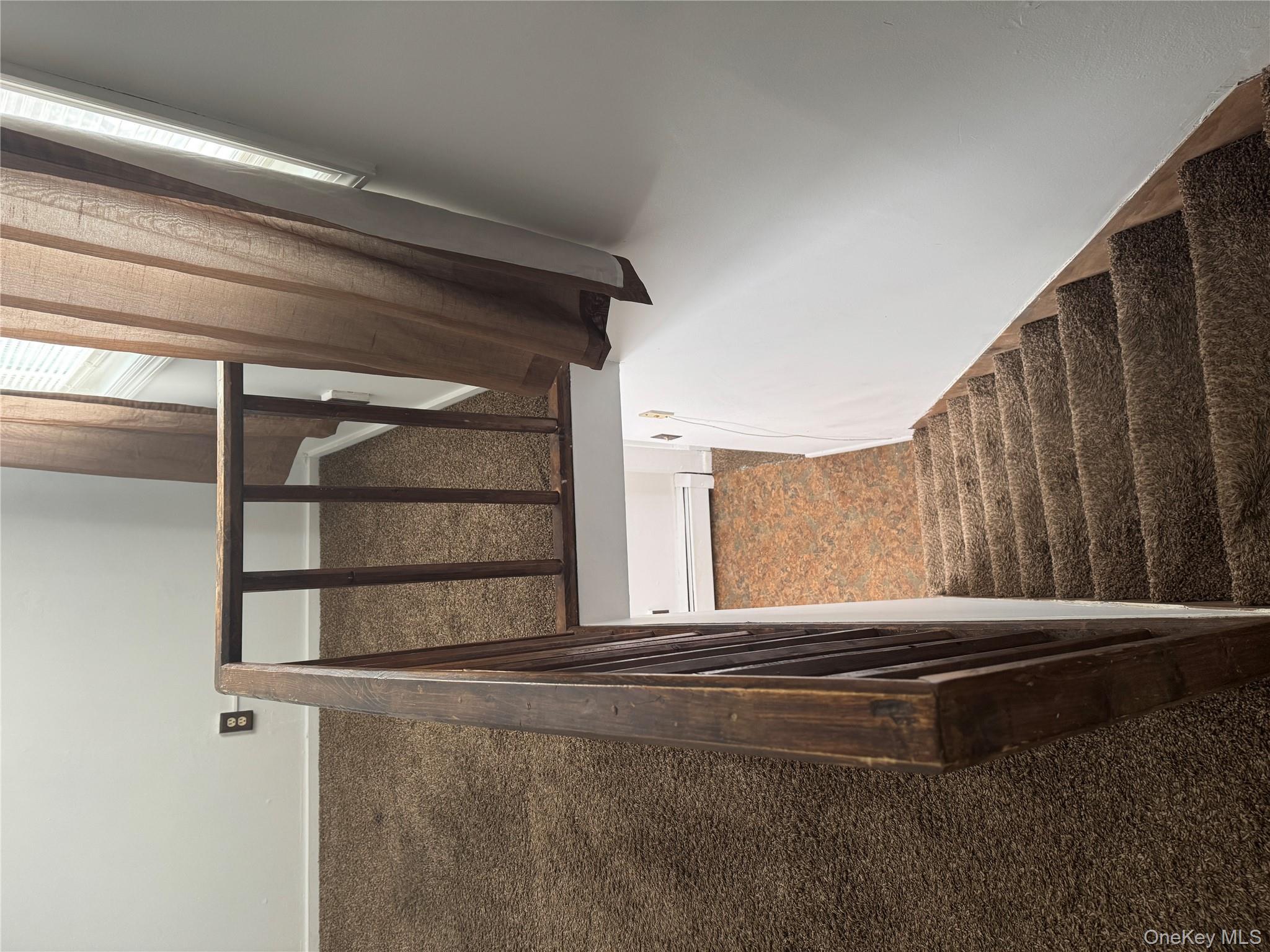 523 Fostertown Road Newburgh, NY 12550 - Photo 13 of 15 Stairway with carpet flooring and baseboard heating