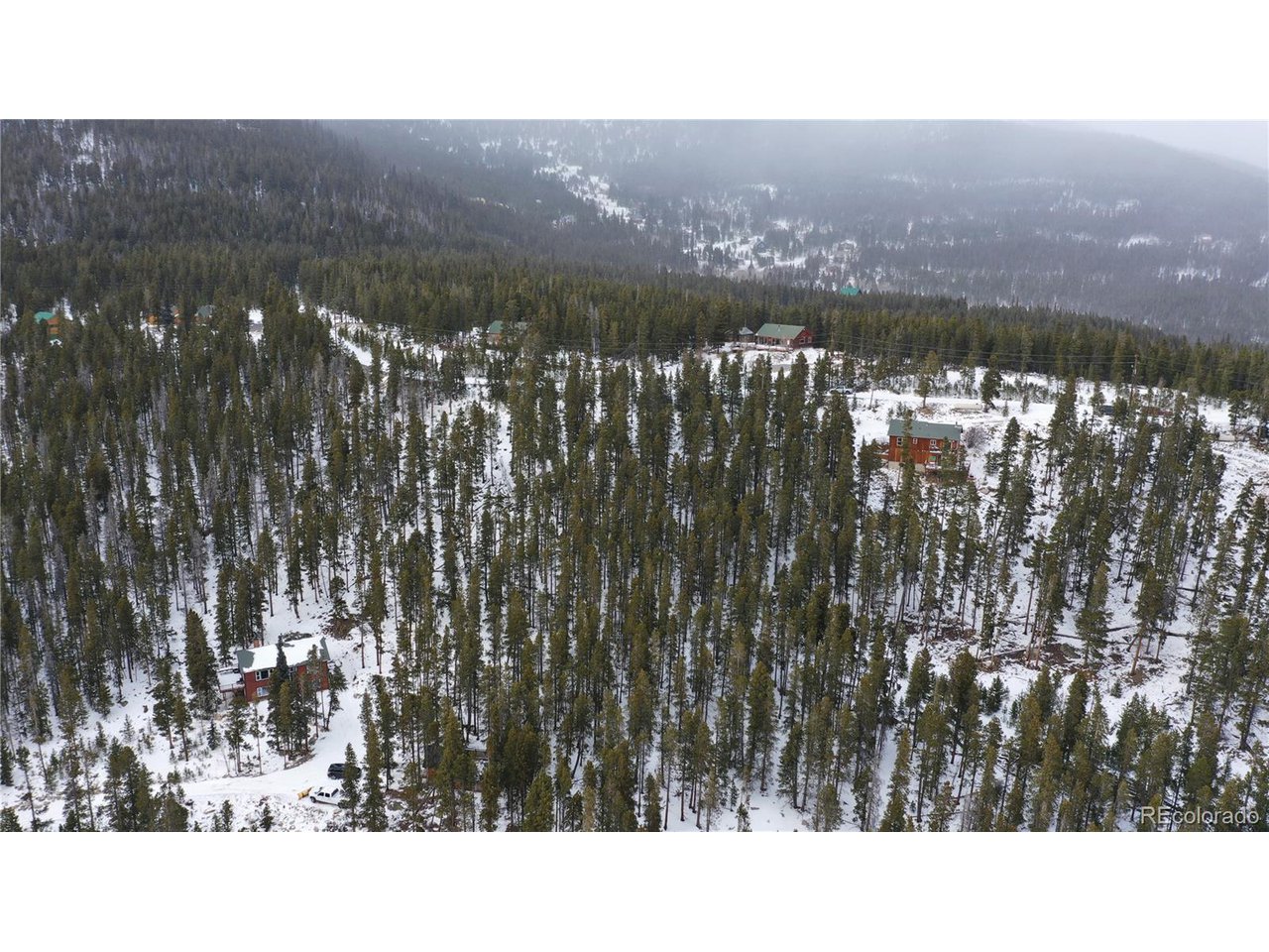37 Vista Road Idaho Springs, CO 80452 - Photo 19 of 27 a black and white photo of a lake