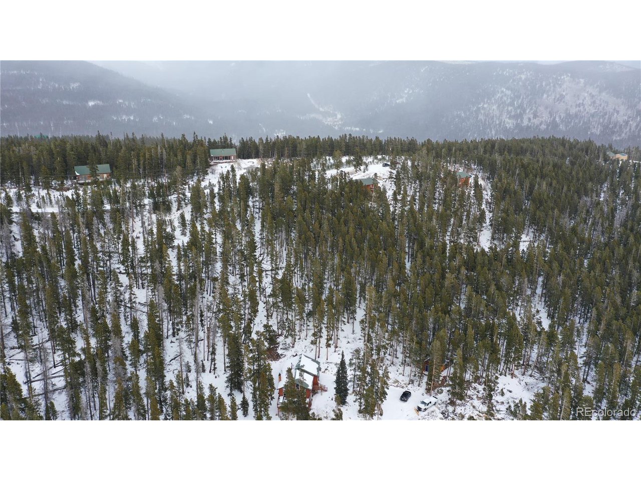 37 Vista Road Idaho Springs, CO 80452 - Photo 22 of 27 a black and white photo of a lake