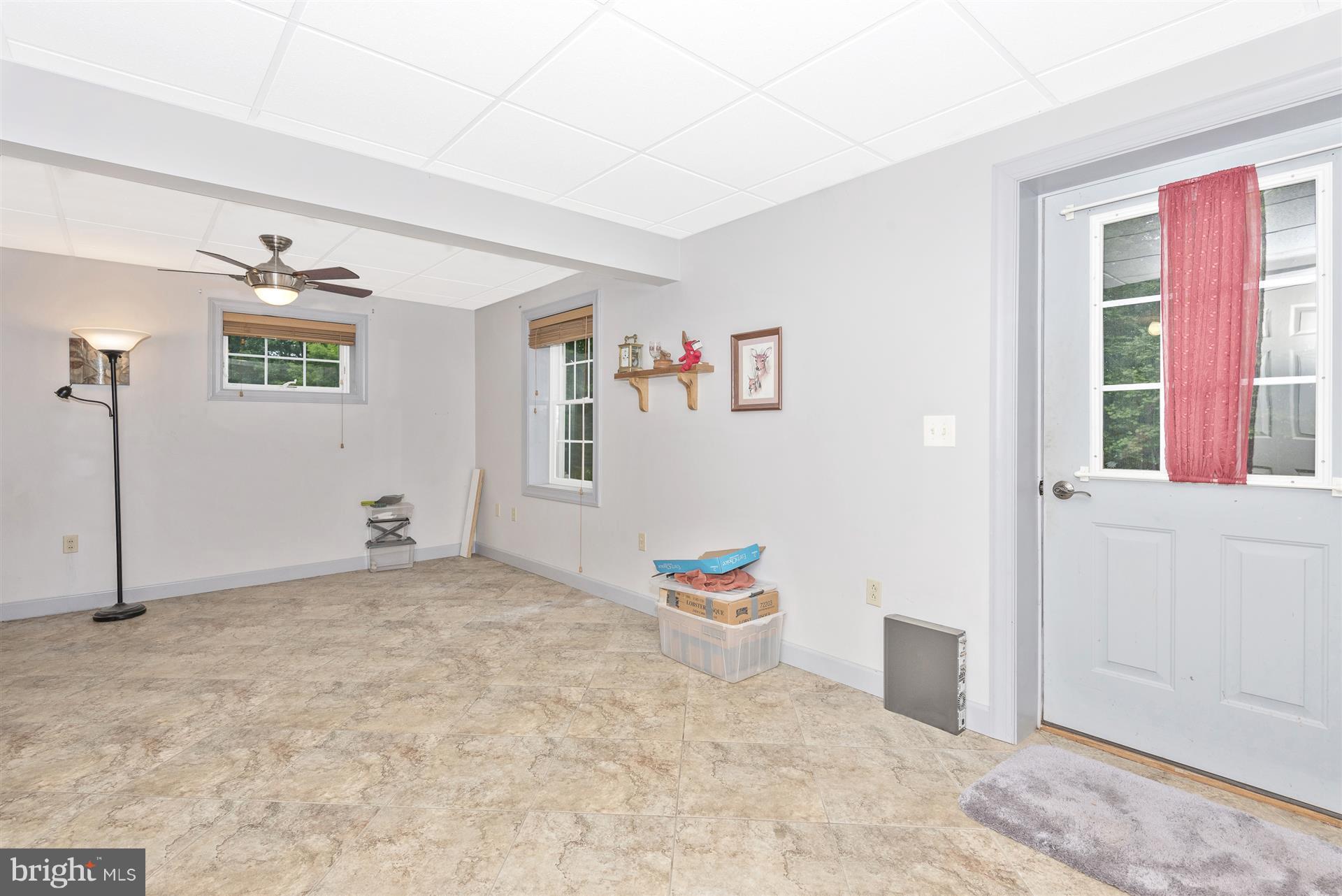 2445 Chestnut Grove Road Sharpsburg, MD 21782 - Photo 24 of 30 Finished basement area with walk-out to yard
