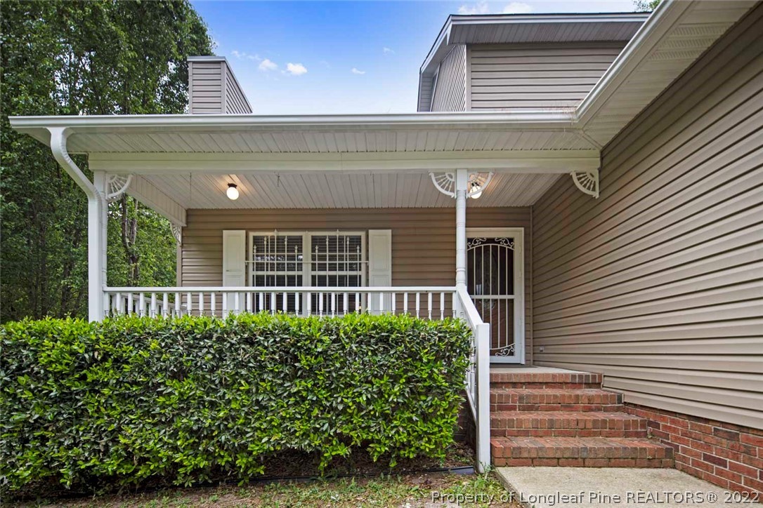 228 Overton Road Raeford, NC 28376 - Photo 2 of 23 a view of a house with plants