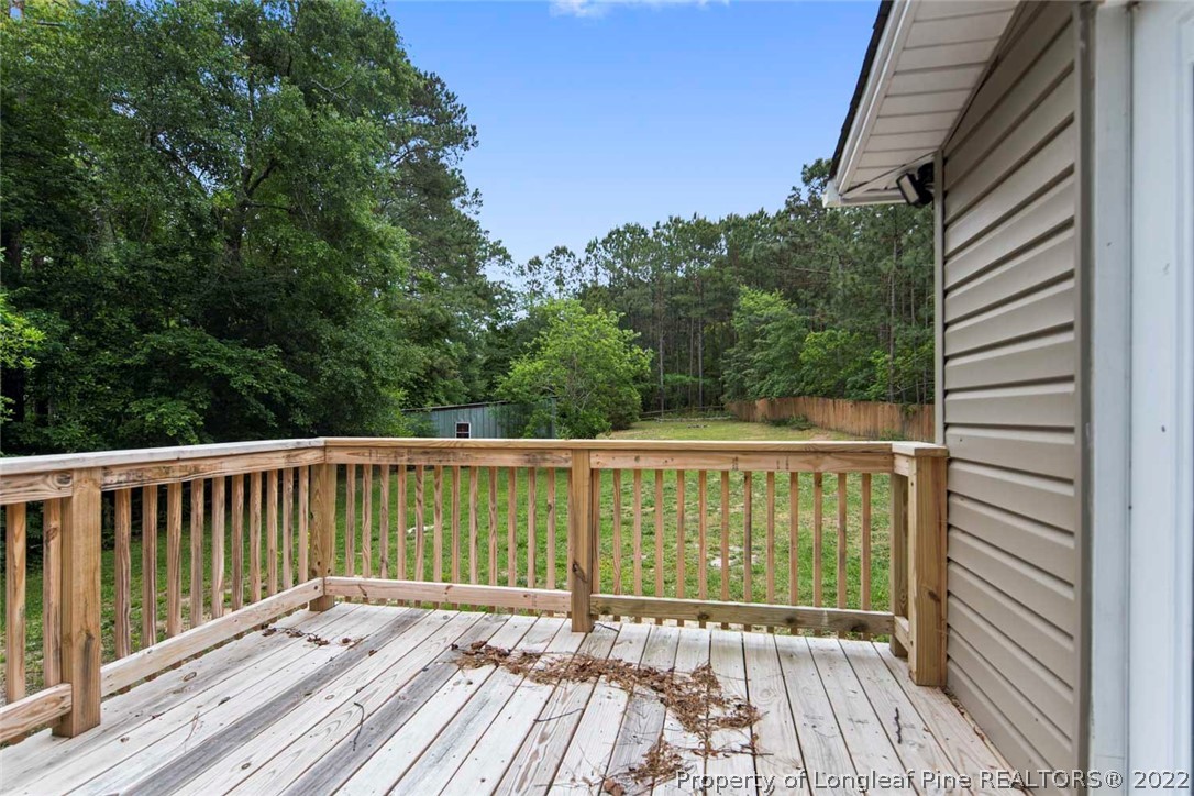 228 Overton Road Raeford, NC 28376 - Photo 21 of 23 a view of balcony with wooden floor