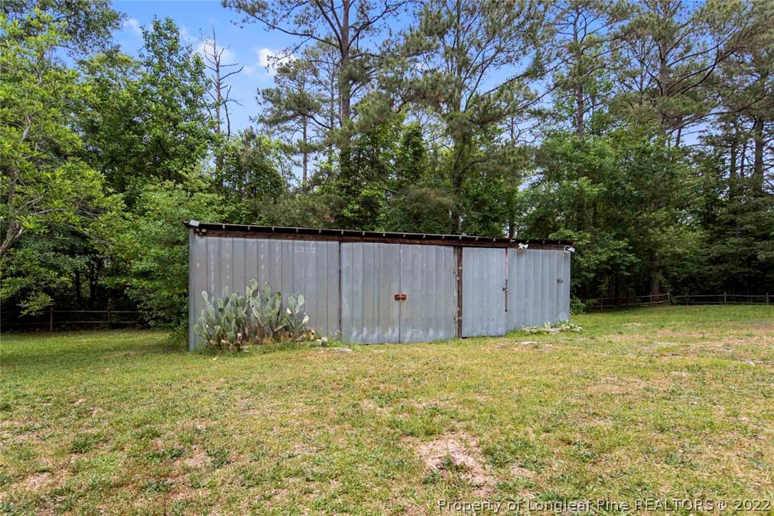 228 Overton Road Raeford, NC 28376 - Photo 22 of 23 a view of a backyard