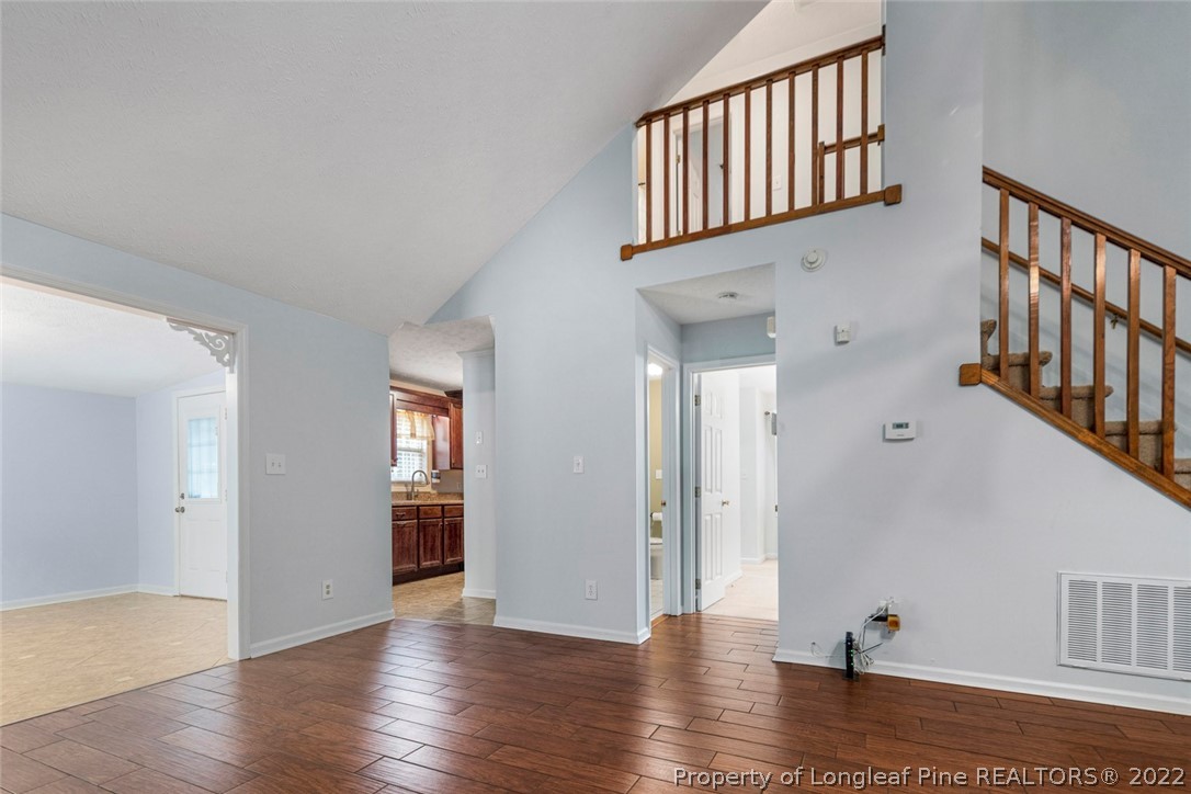 228 Overton Road Raeford, NC 28376 - Photo 6 of 23 a view of an entryway with wooden floor