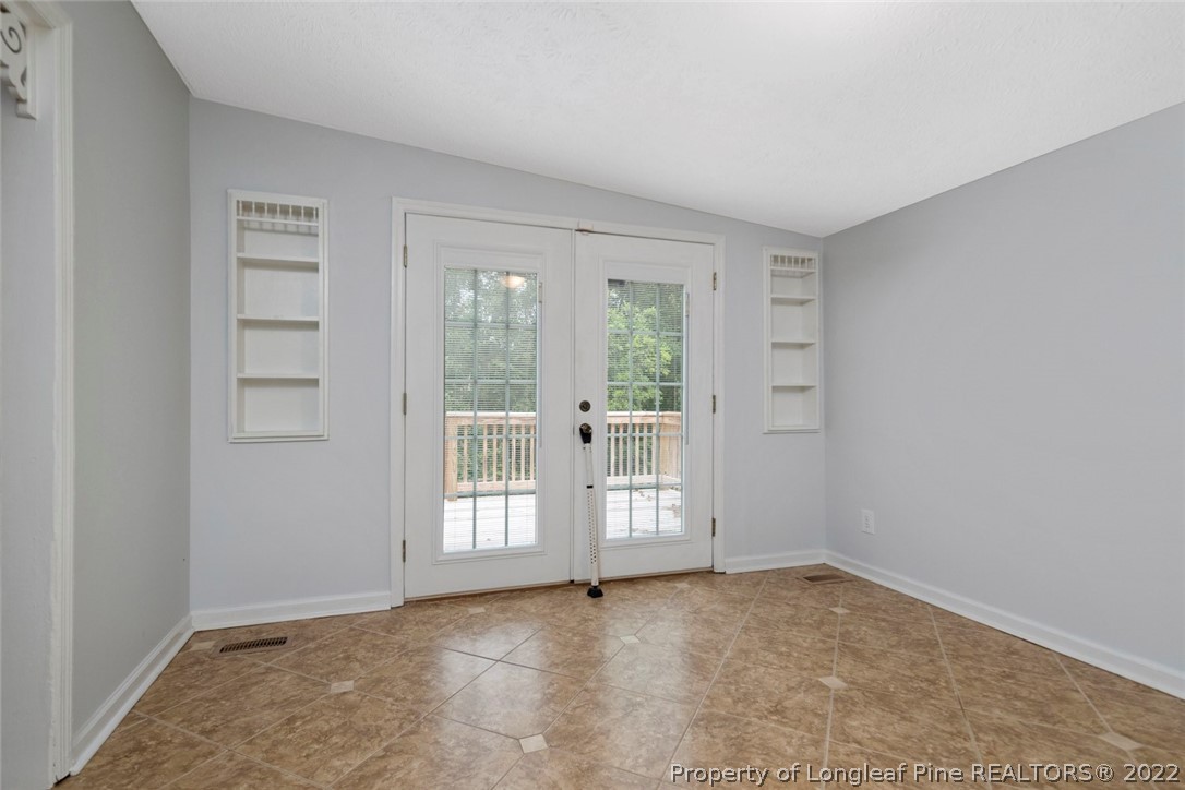 228 Overton Road Raeford, NC 28376 - Photo 9 of 23 an empty room with windows