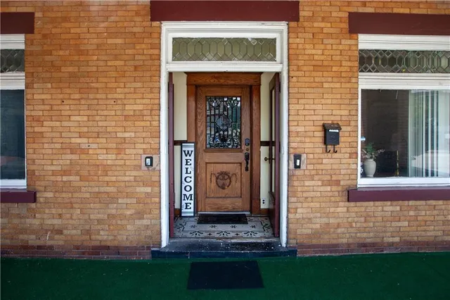 a front view of a house with an entrance