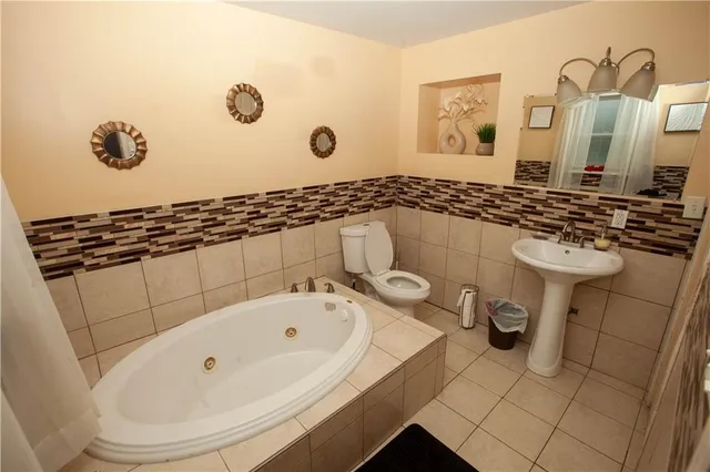 a bathroom with a sink and a toilet