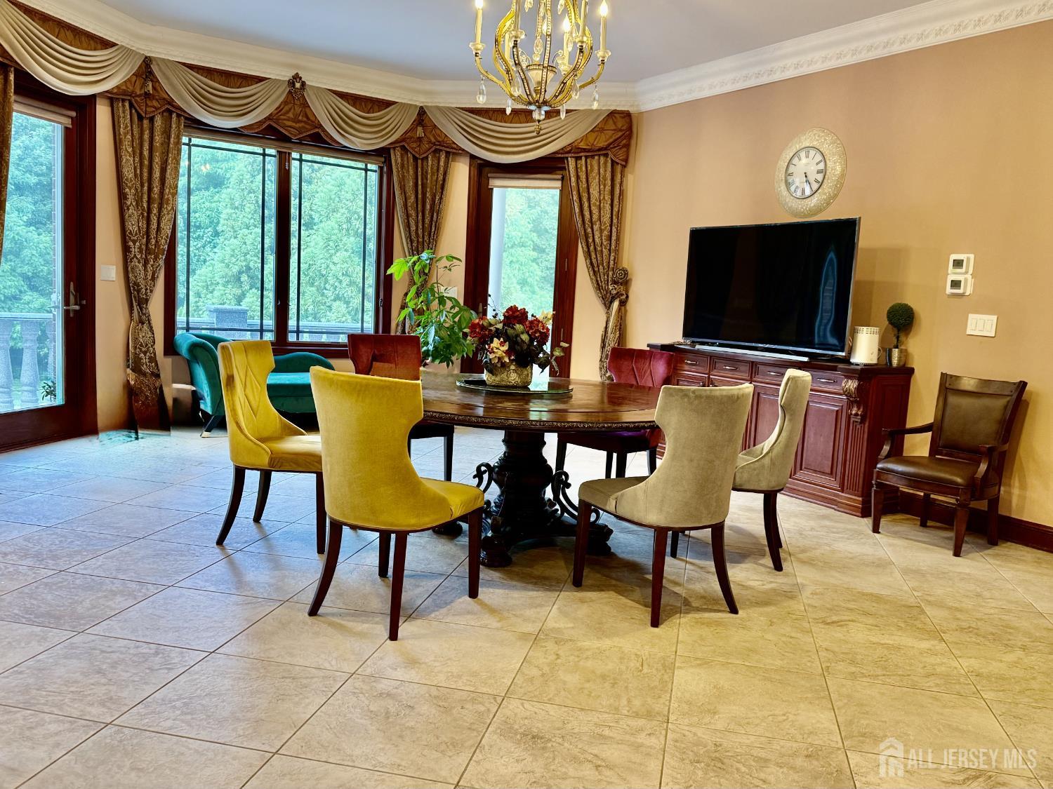 34 Line Road Holmdel, NJ 07733 - Photo 16 of 35 a view of a dining room with furniture window and outside view
