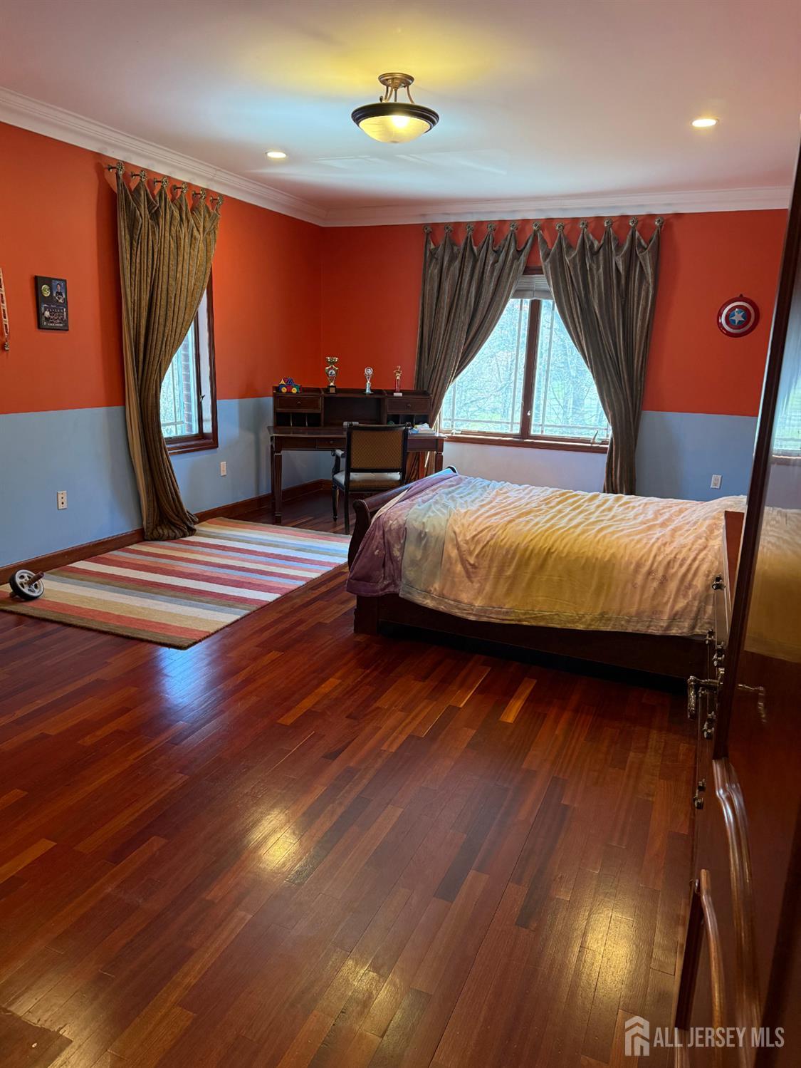 34 Line Road Holmdel, NJ 07733 - Photo 17 of 35 a bedroom with a bed window and dresser