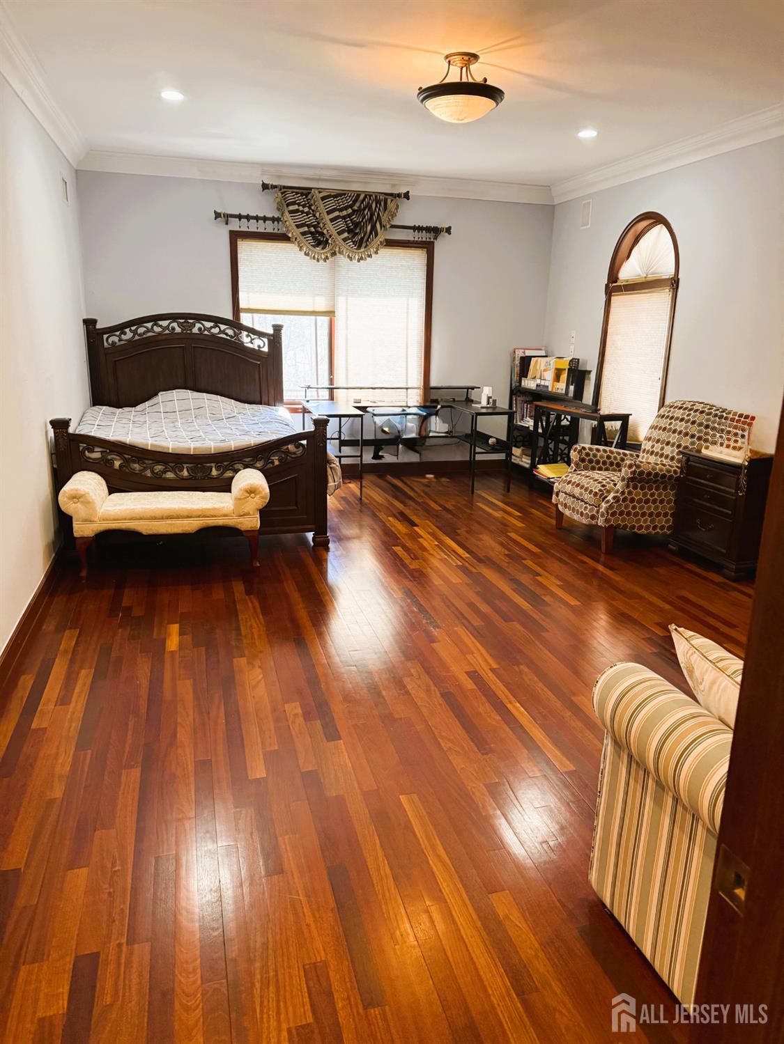 34 Line Road Holmdel, NJ 07733 - Photo 18 of 35 a living room with furniture and a wooden floor