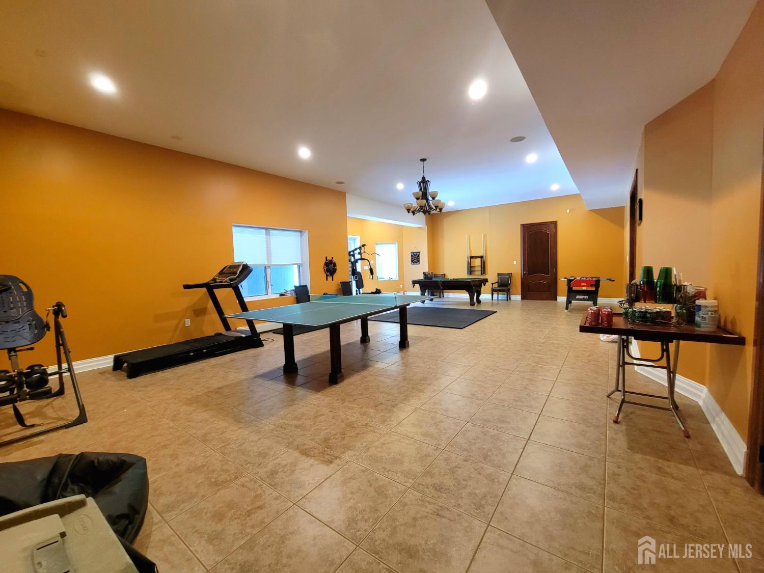 34 Line Road Holmdel, NJ 07733 - Photo 28 of 35 a view of a room with gym equipment