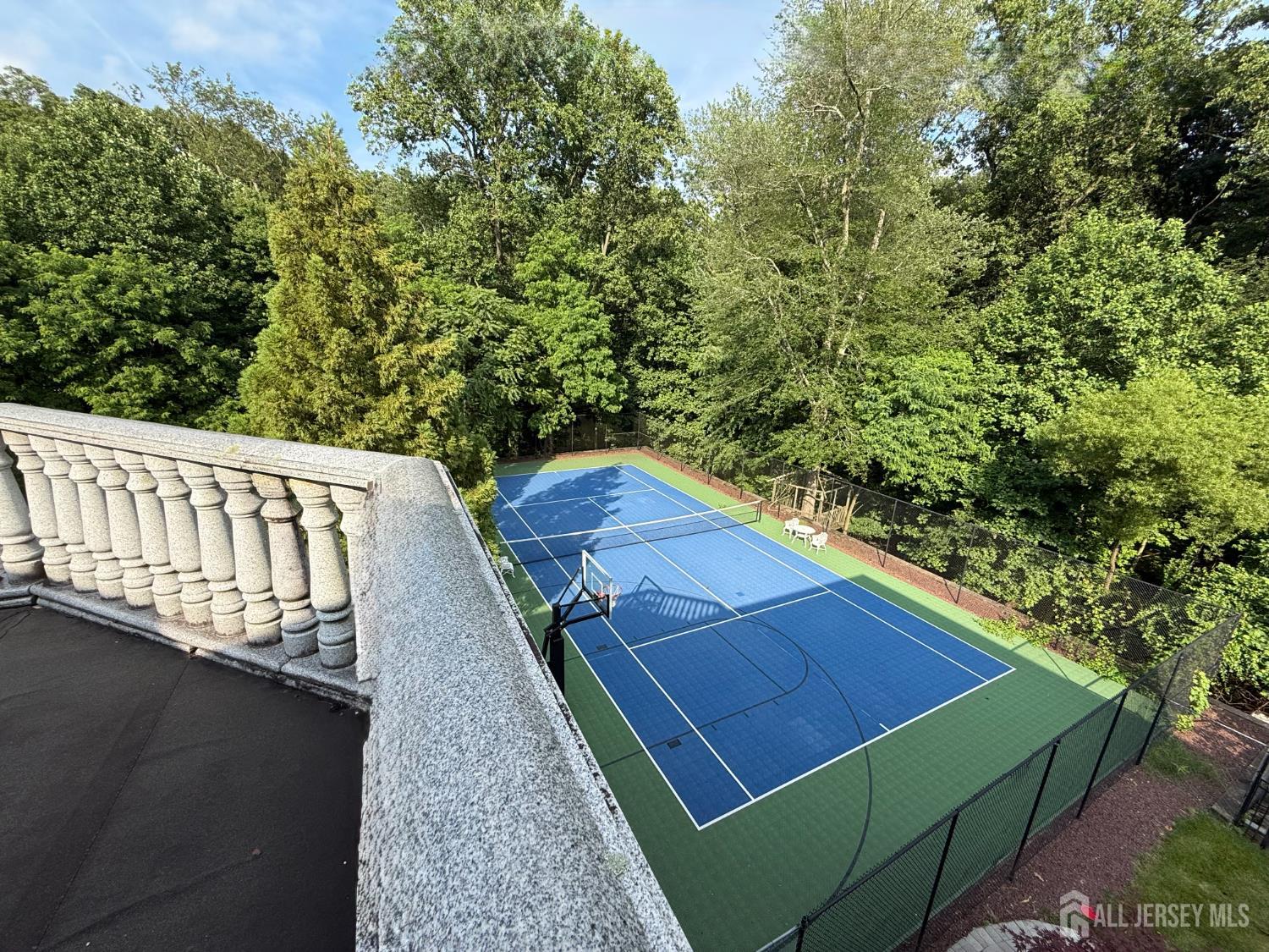34 Line Road Holmdel, NJ 07733 - Photo 35 of 35 a view of a balcony with two chairs