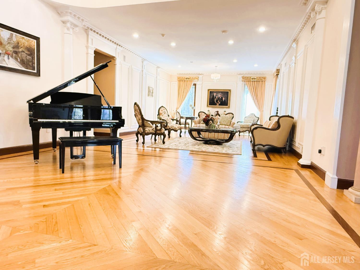 34 Line Road Holmdel, NJ 07733 - Photo 9 of 35 a living room with furniture and a wooden floor